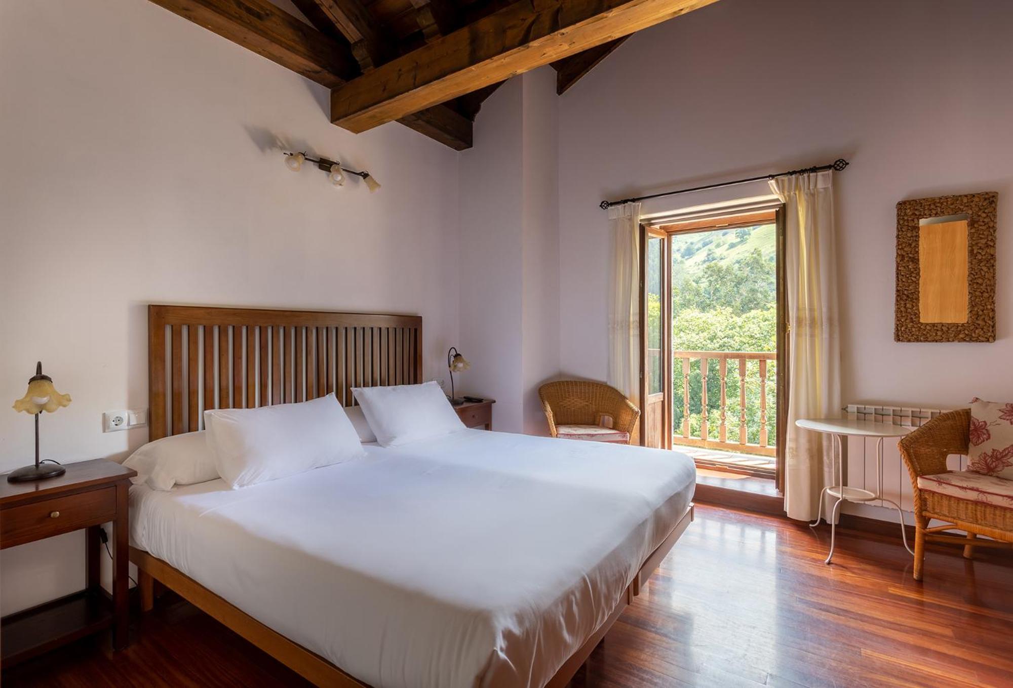 Habitación King con Balcón