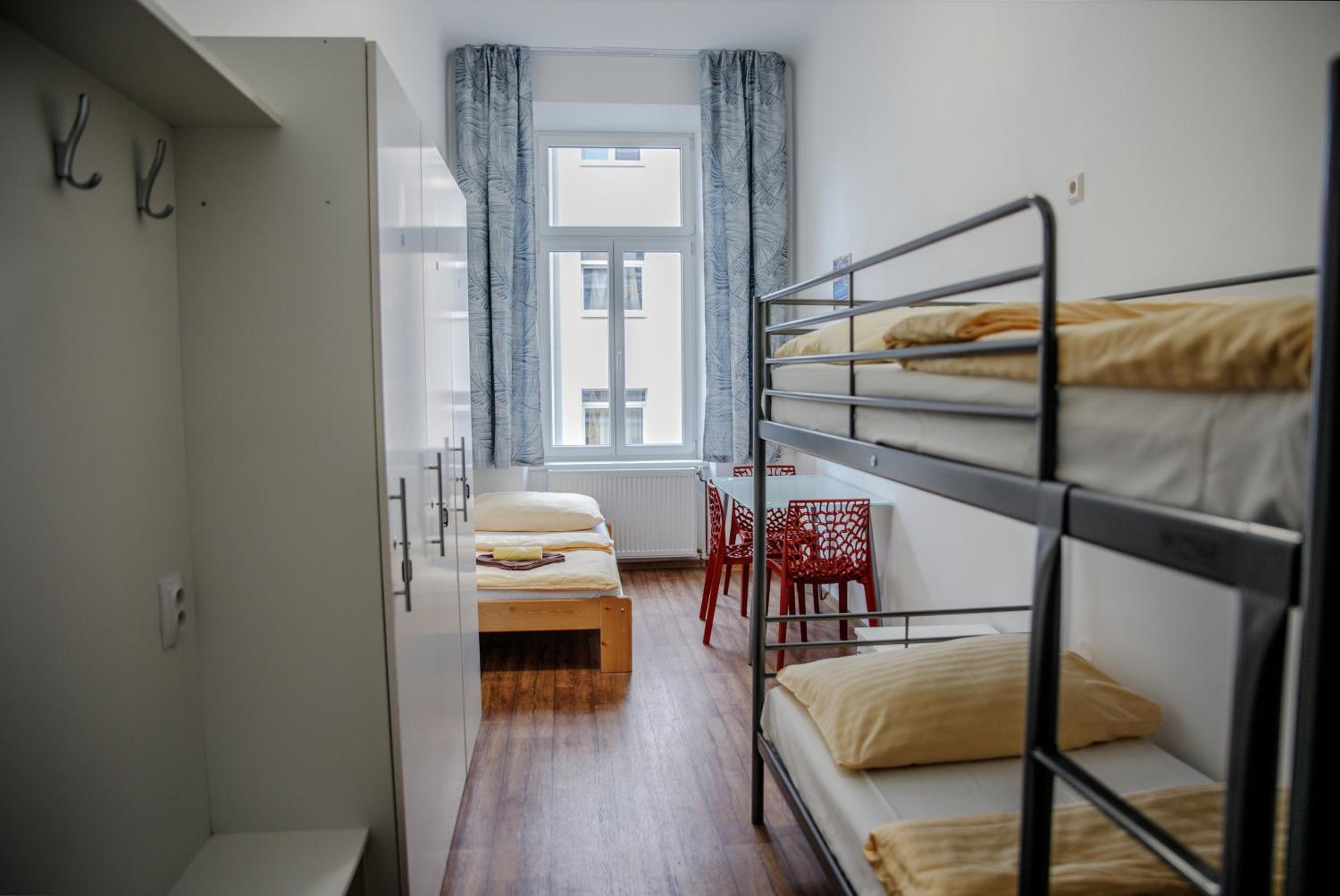Single Bed in Female Dormitory Room with Shared Bathroom photo 1