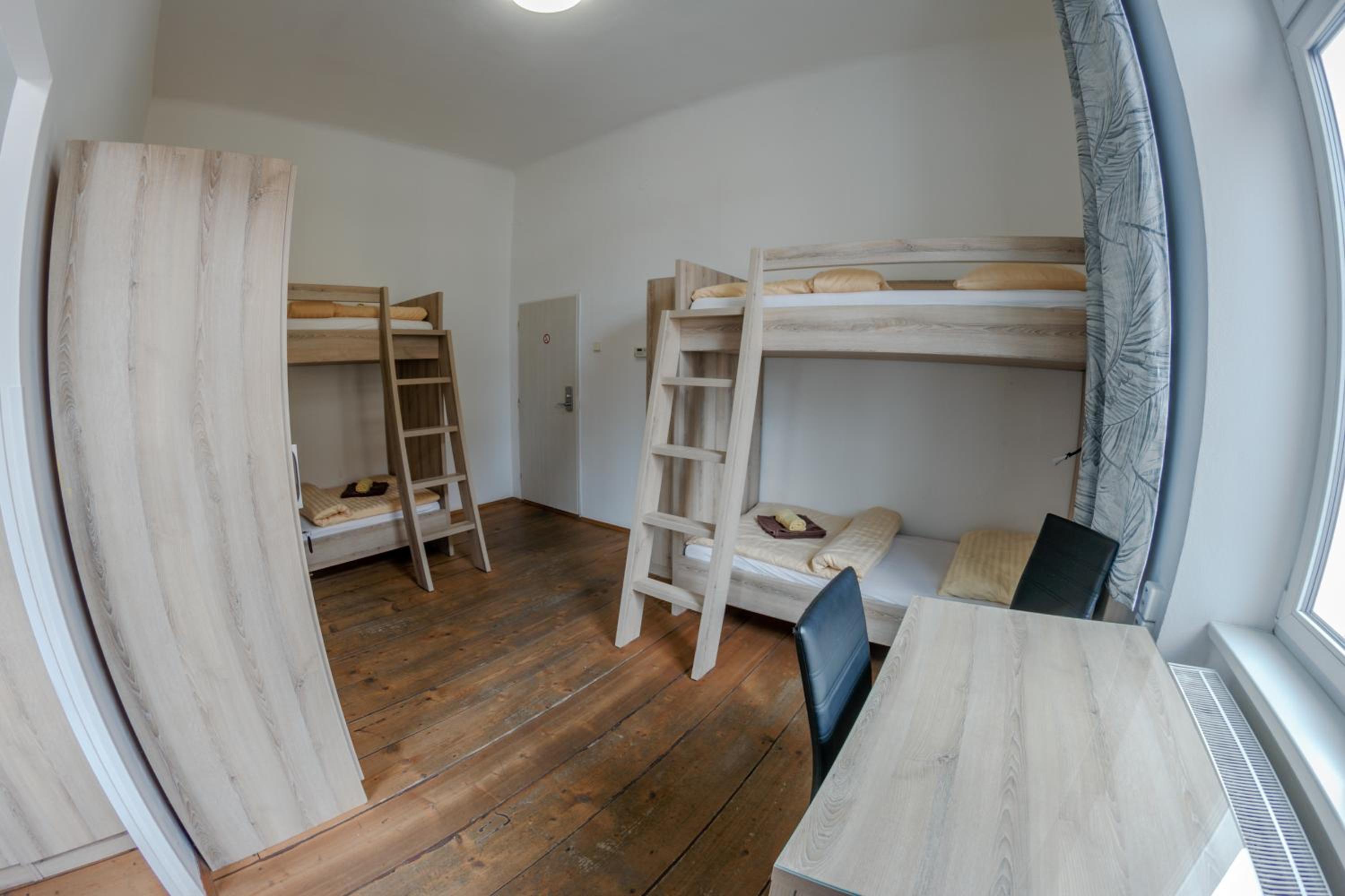Single Bed in Male Dormitory Room with Shared Bathroom photo 1