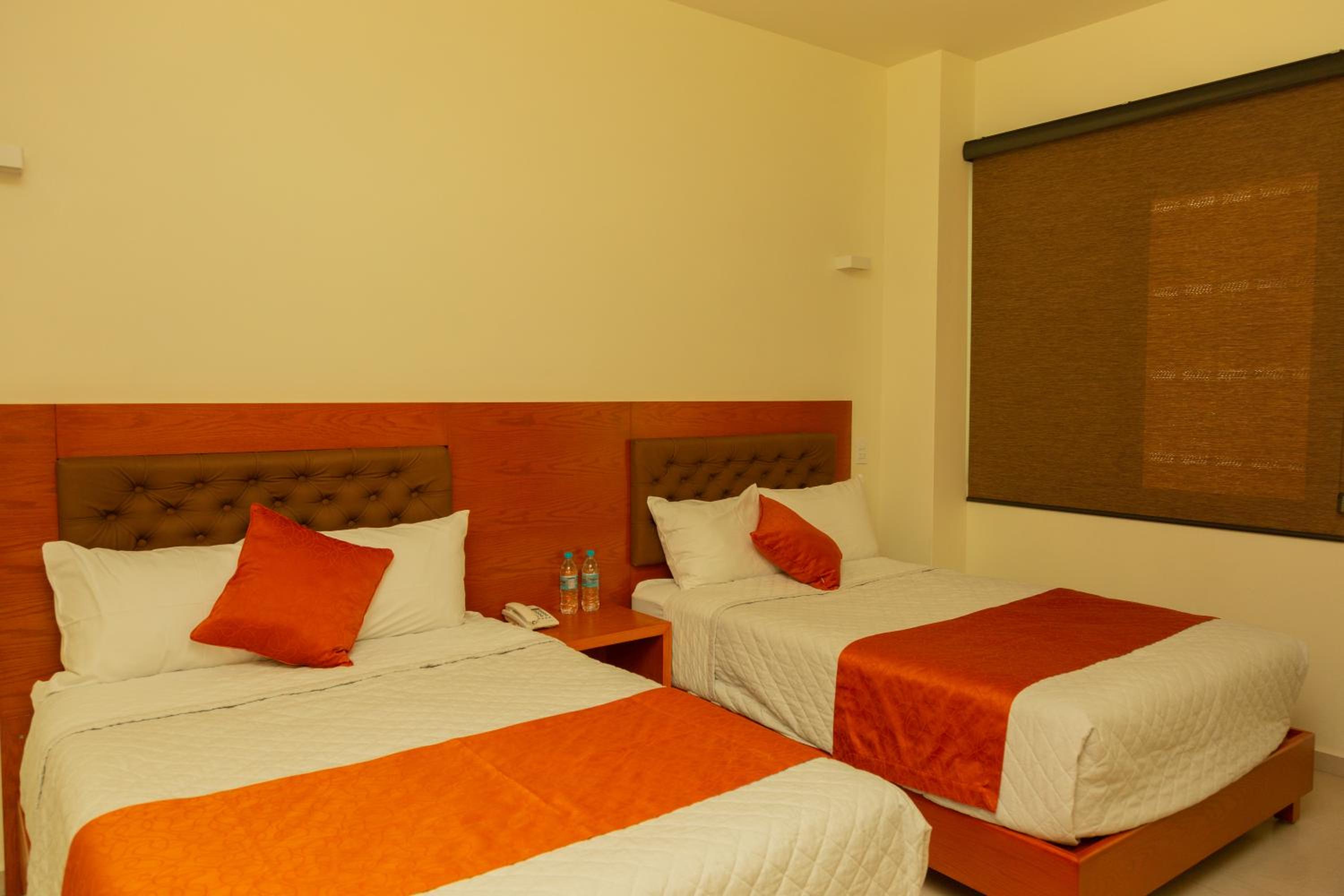 Deluxe Queen Room with Two Queen Beds photo 1