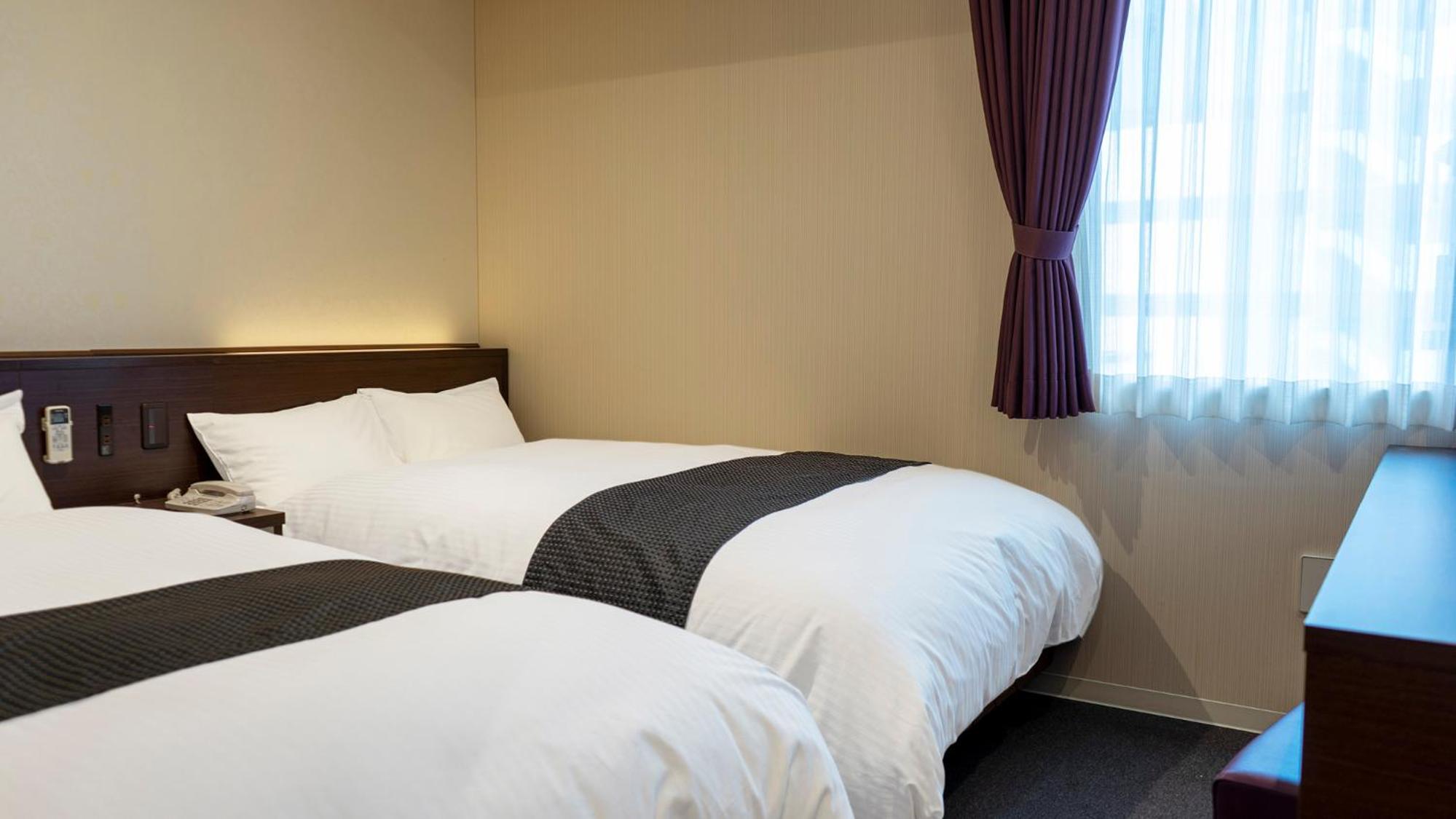 Twin Room - Smoking (E-Cigarettes Only) - Photo 1