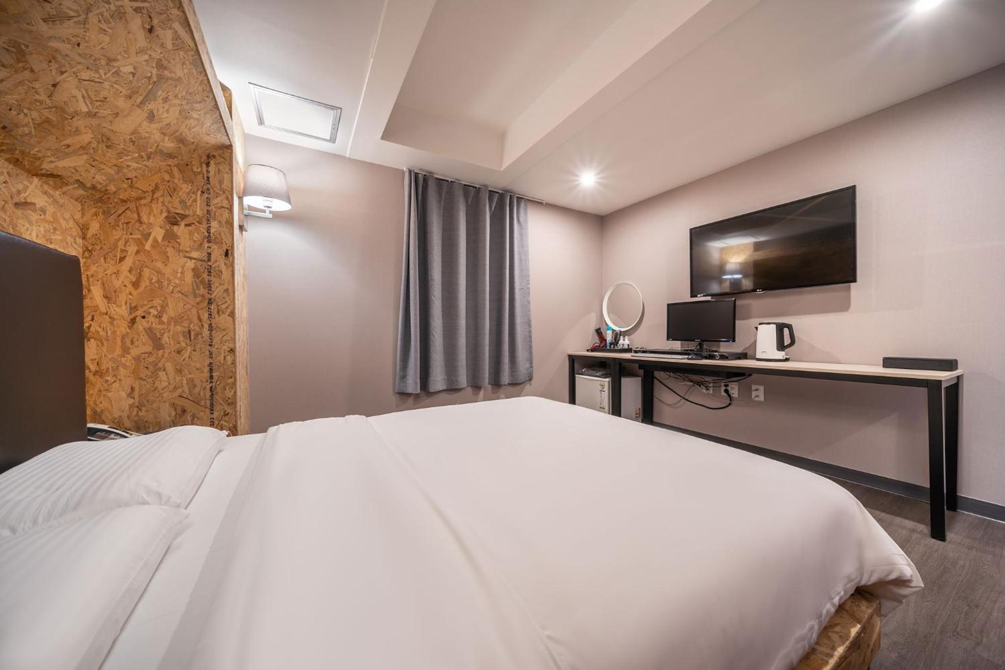 Economy Triple Room - Photo 2