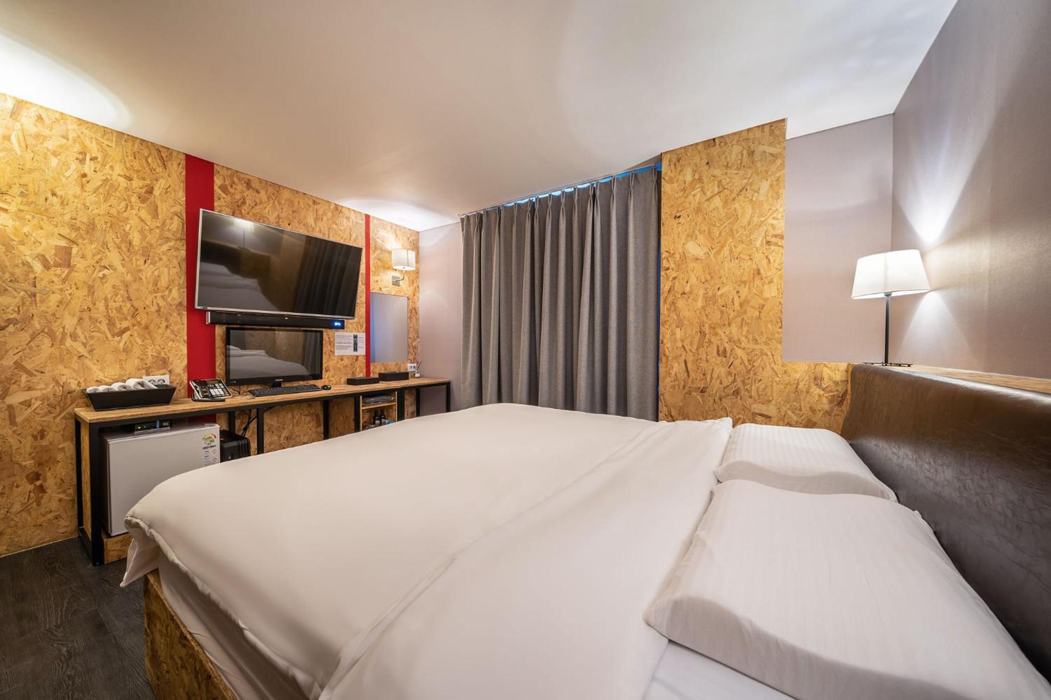 Deluxe Triple Room - Photo 9