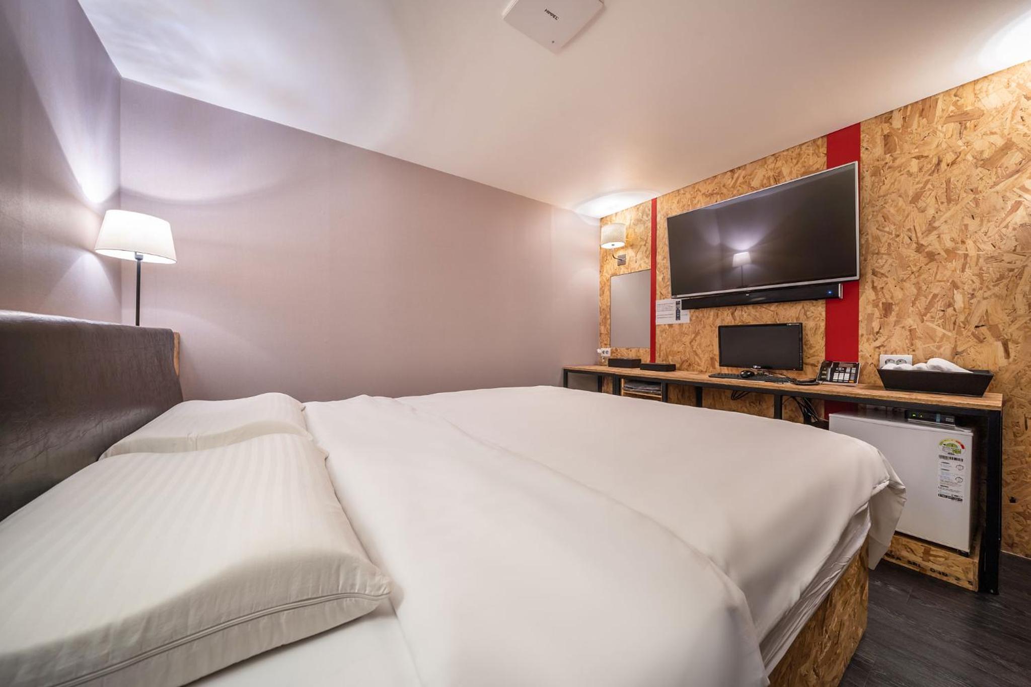 Deluxe Triple Room - Photo 12