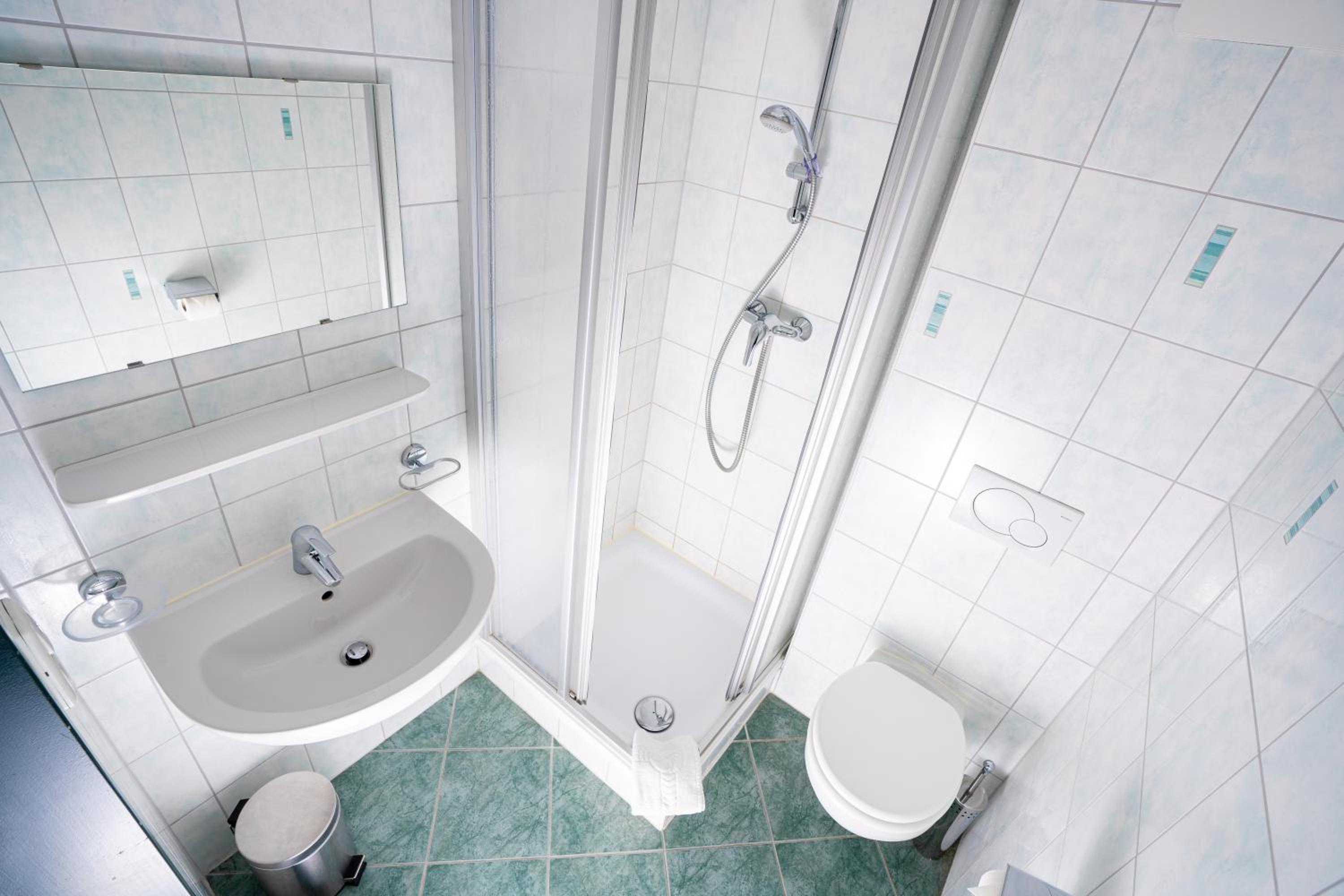 Triple Room with Balcony - Photo 11