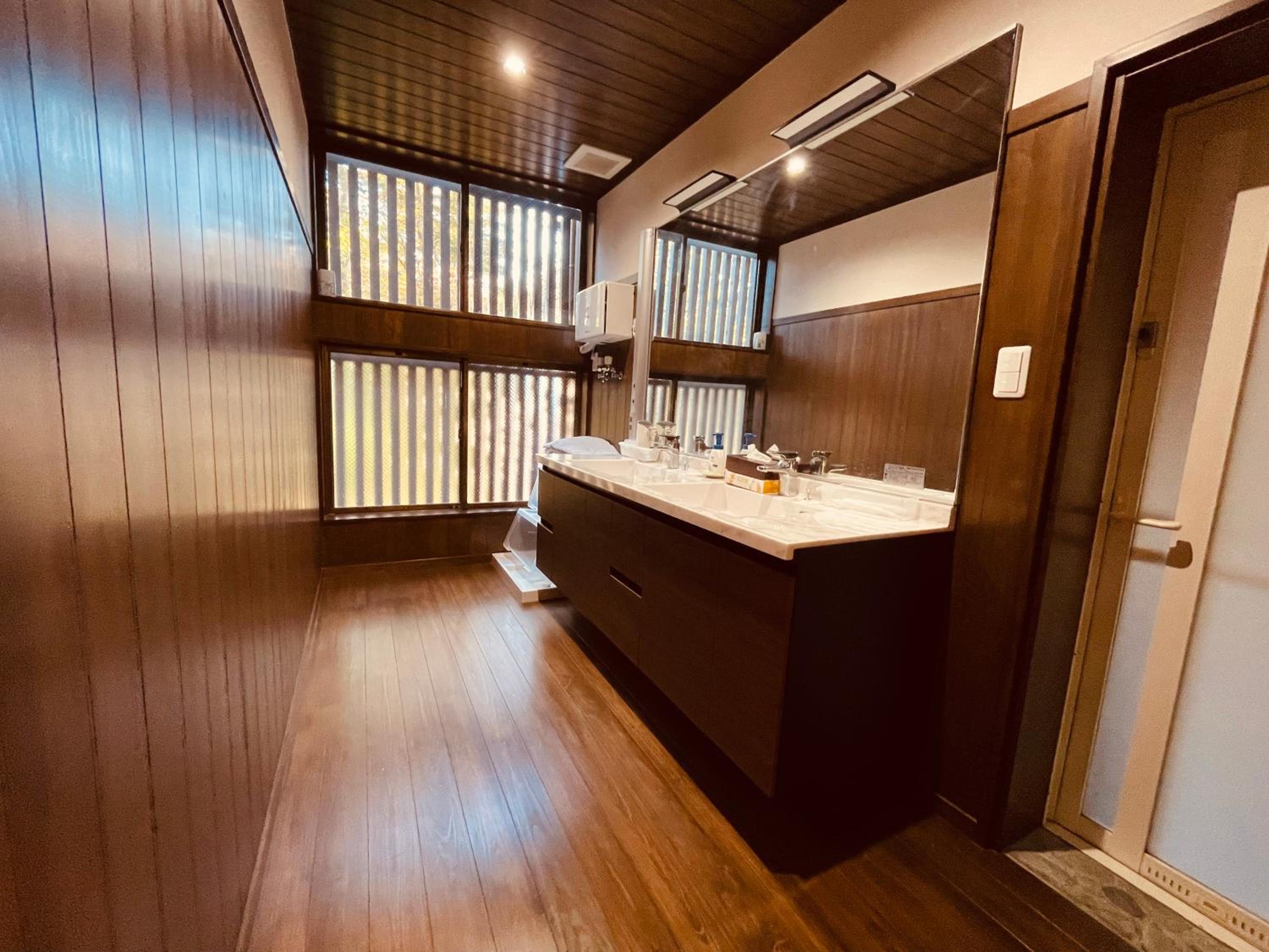 Four-Bedroom House - Photo 28