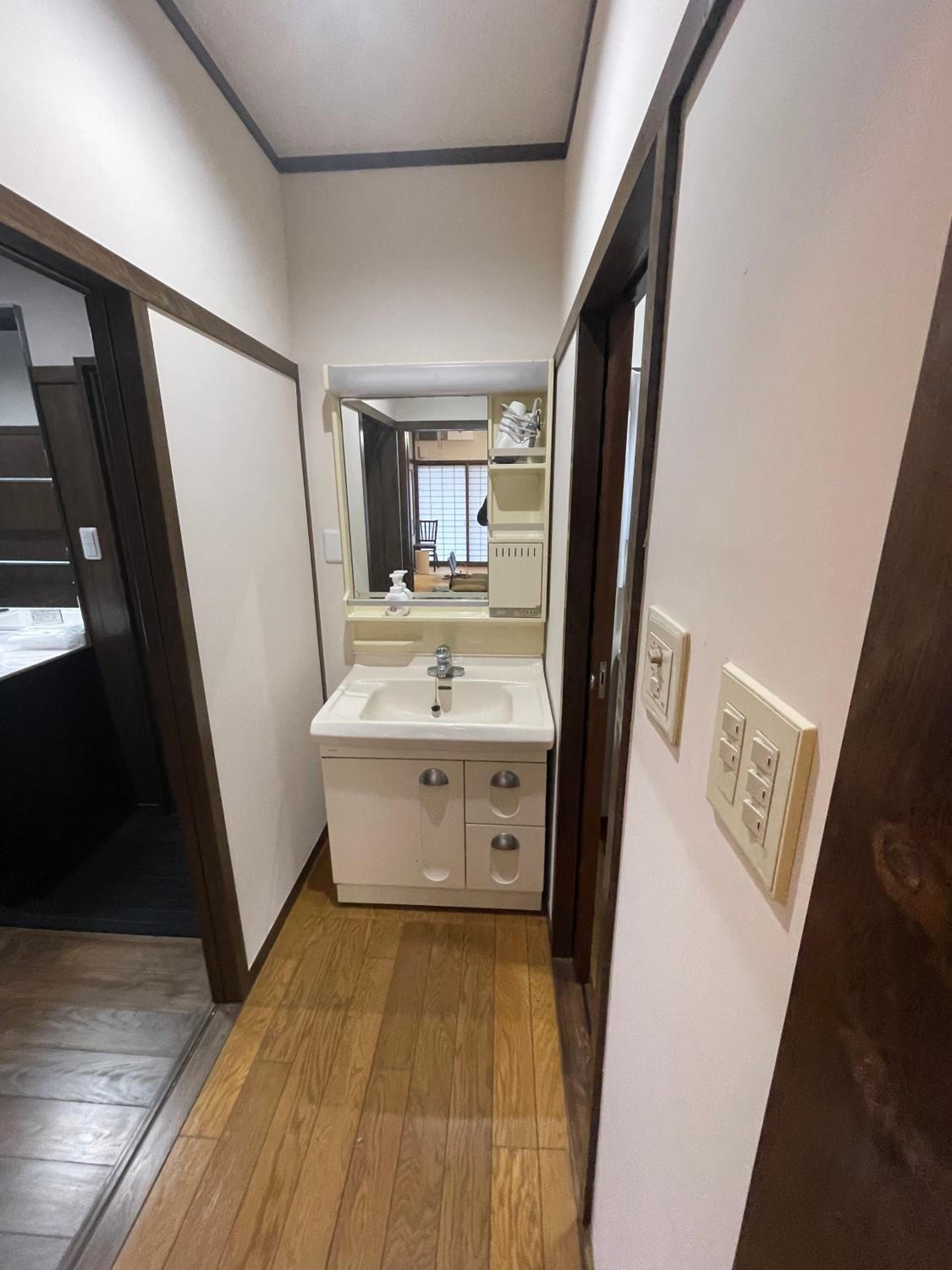 Four-Bedroom House - Photo 27