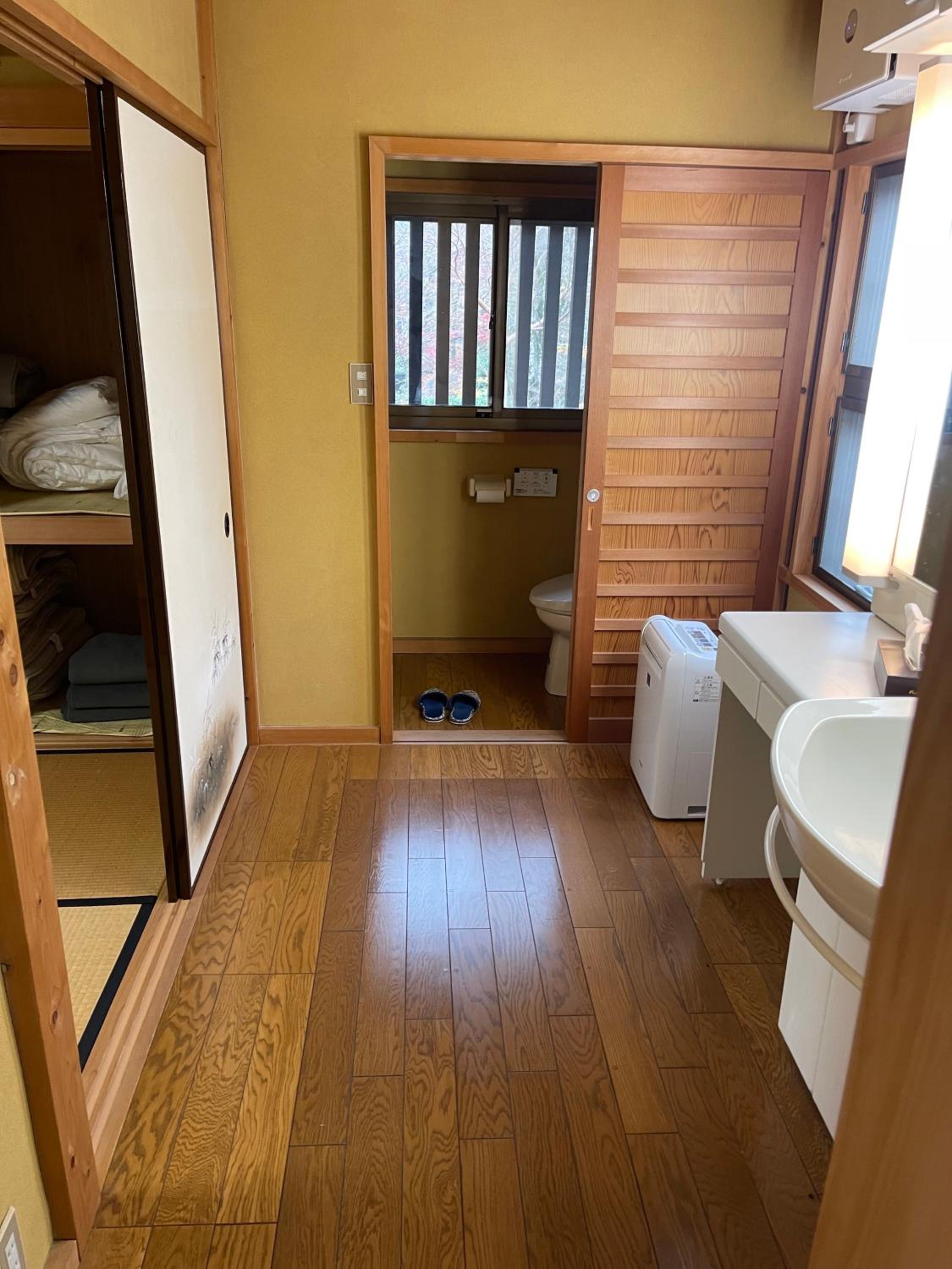 Four-Bedroom House - Photo 25