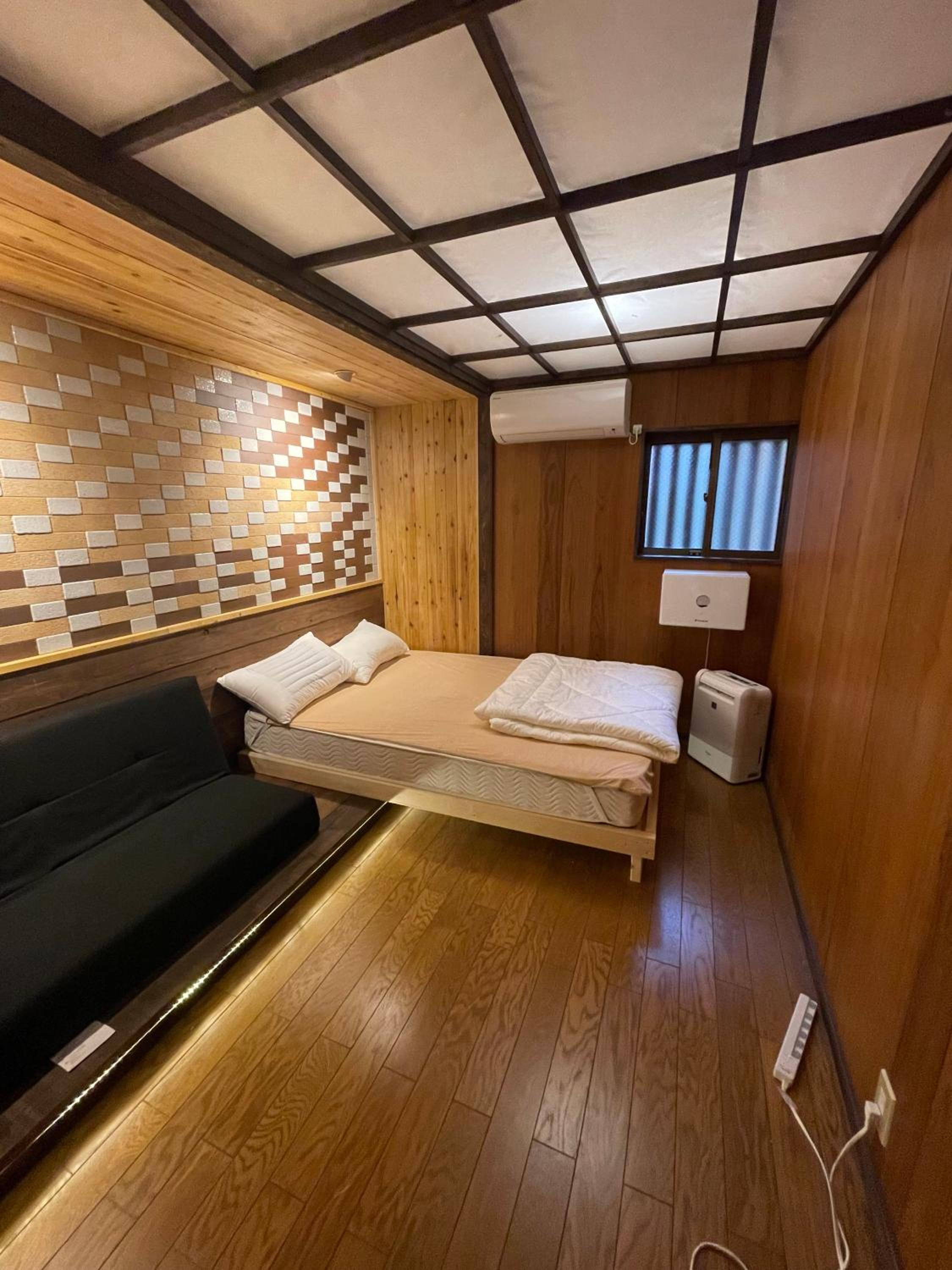 Four-Bedroom House - Photo 22