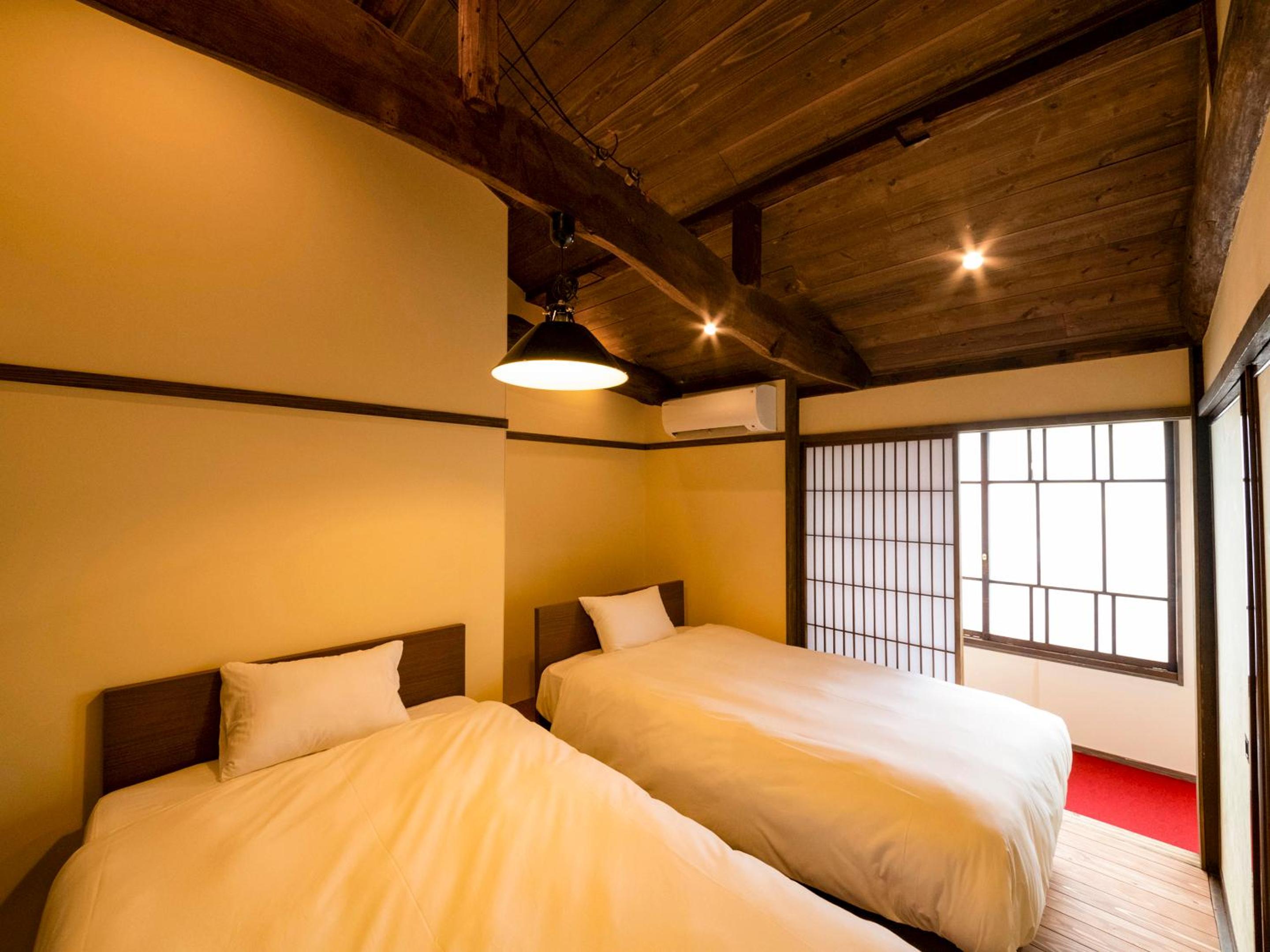 Twin Room - Photo 1