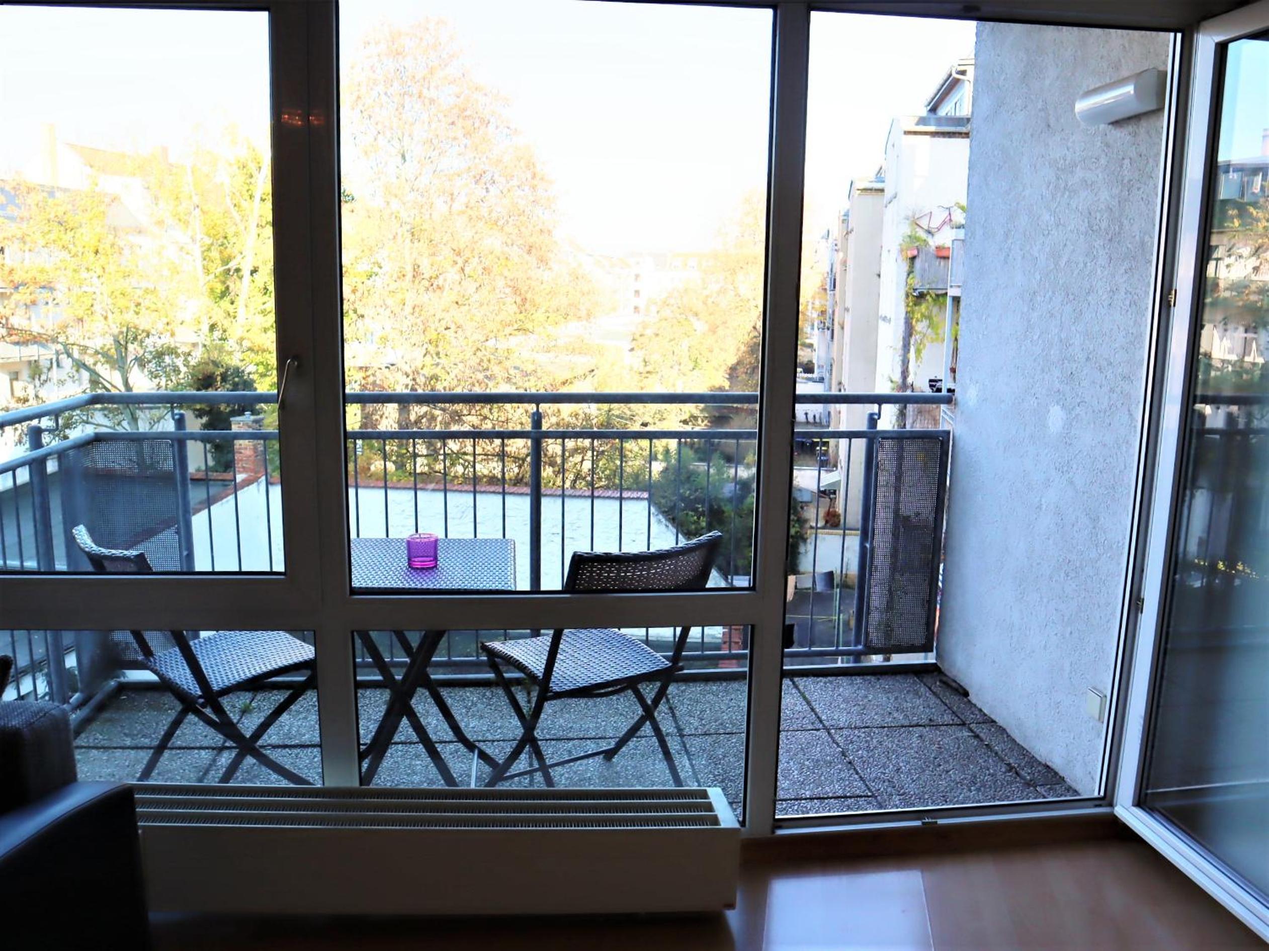 Apartment with Balcony - Photo 3