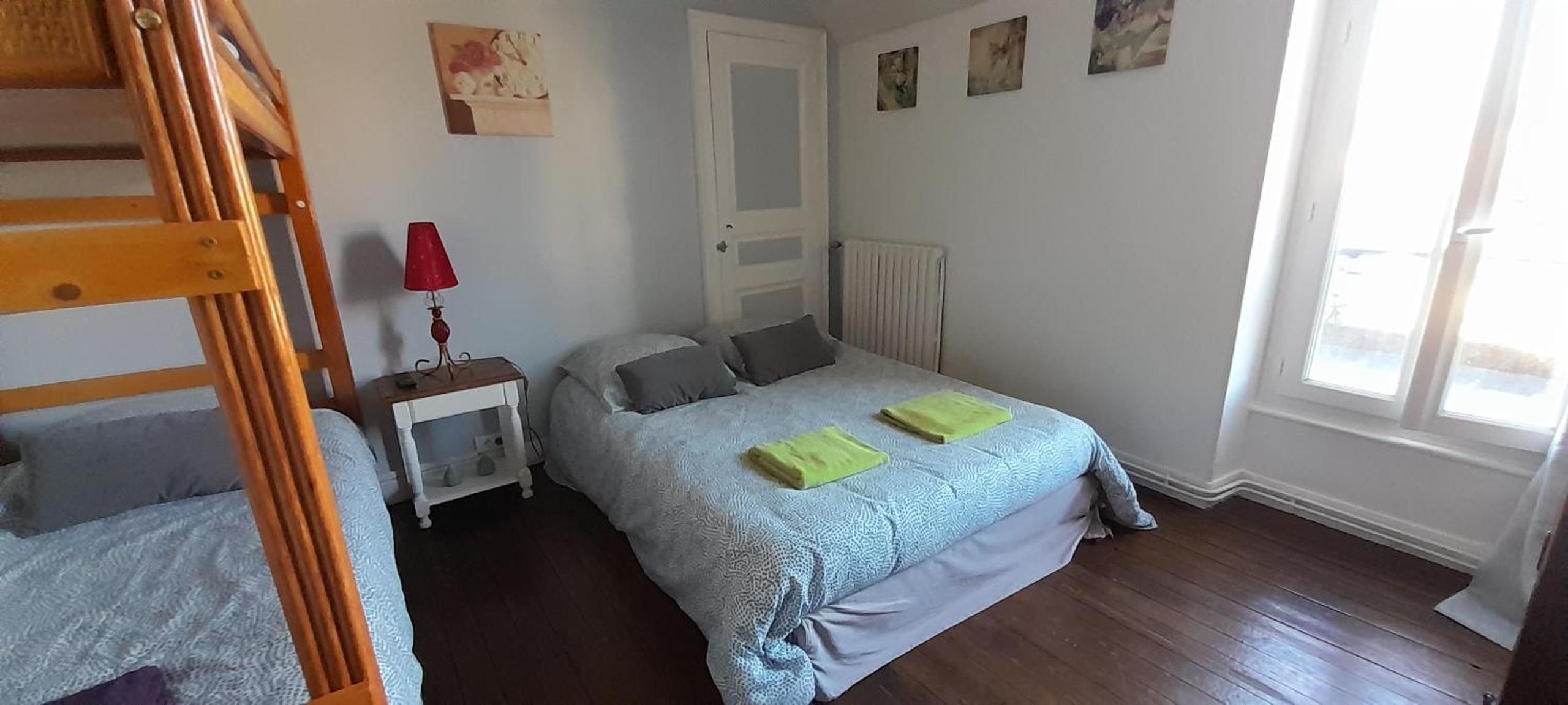 Three-Bedroom House - Photo 24