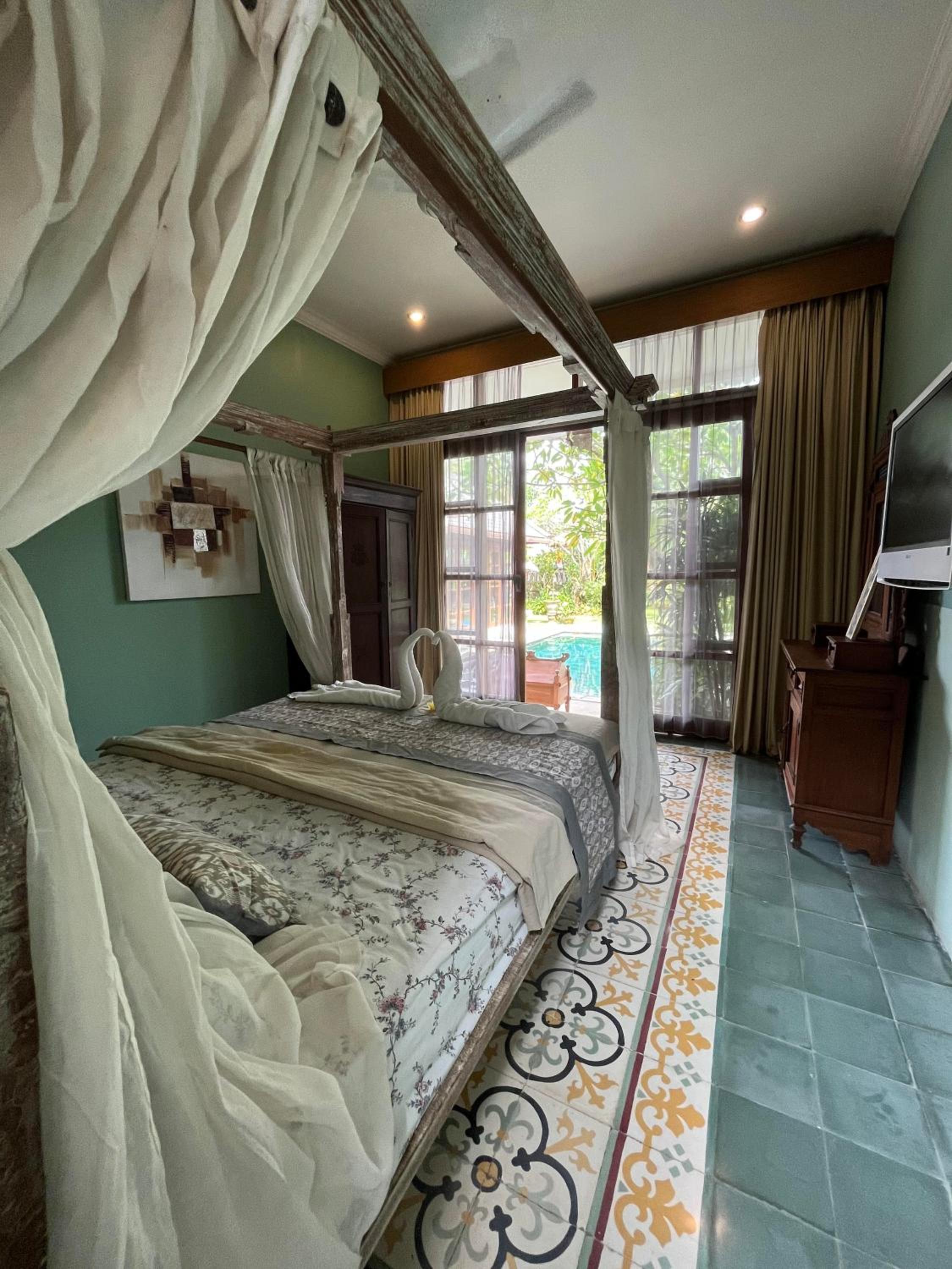 Deluxe Queen Room - Photo 10