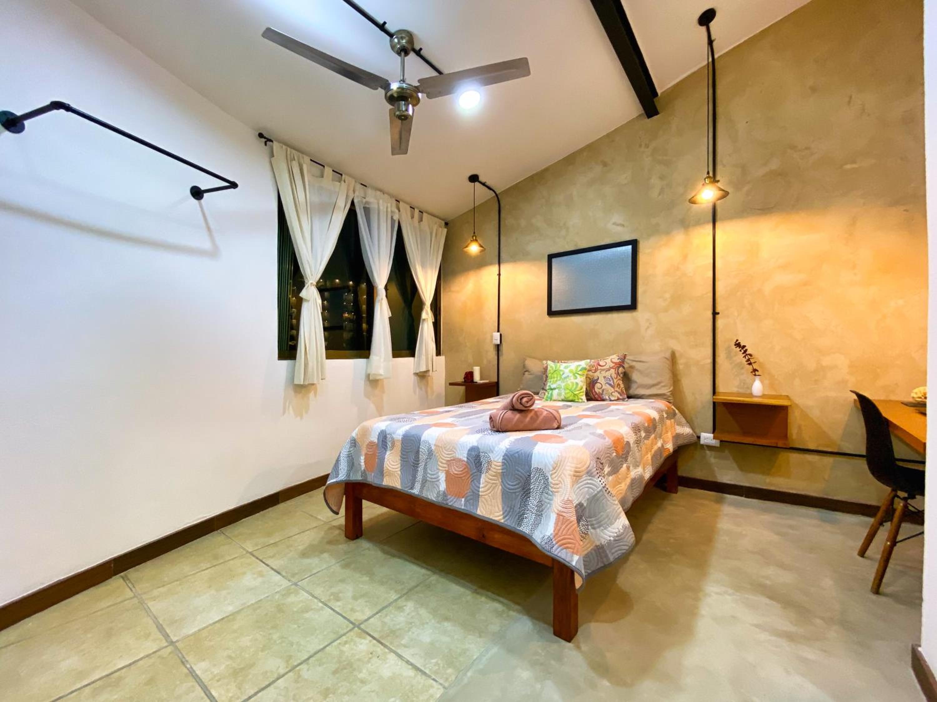 Queen Room with Shared Bathroom