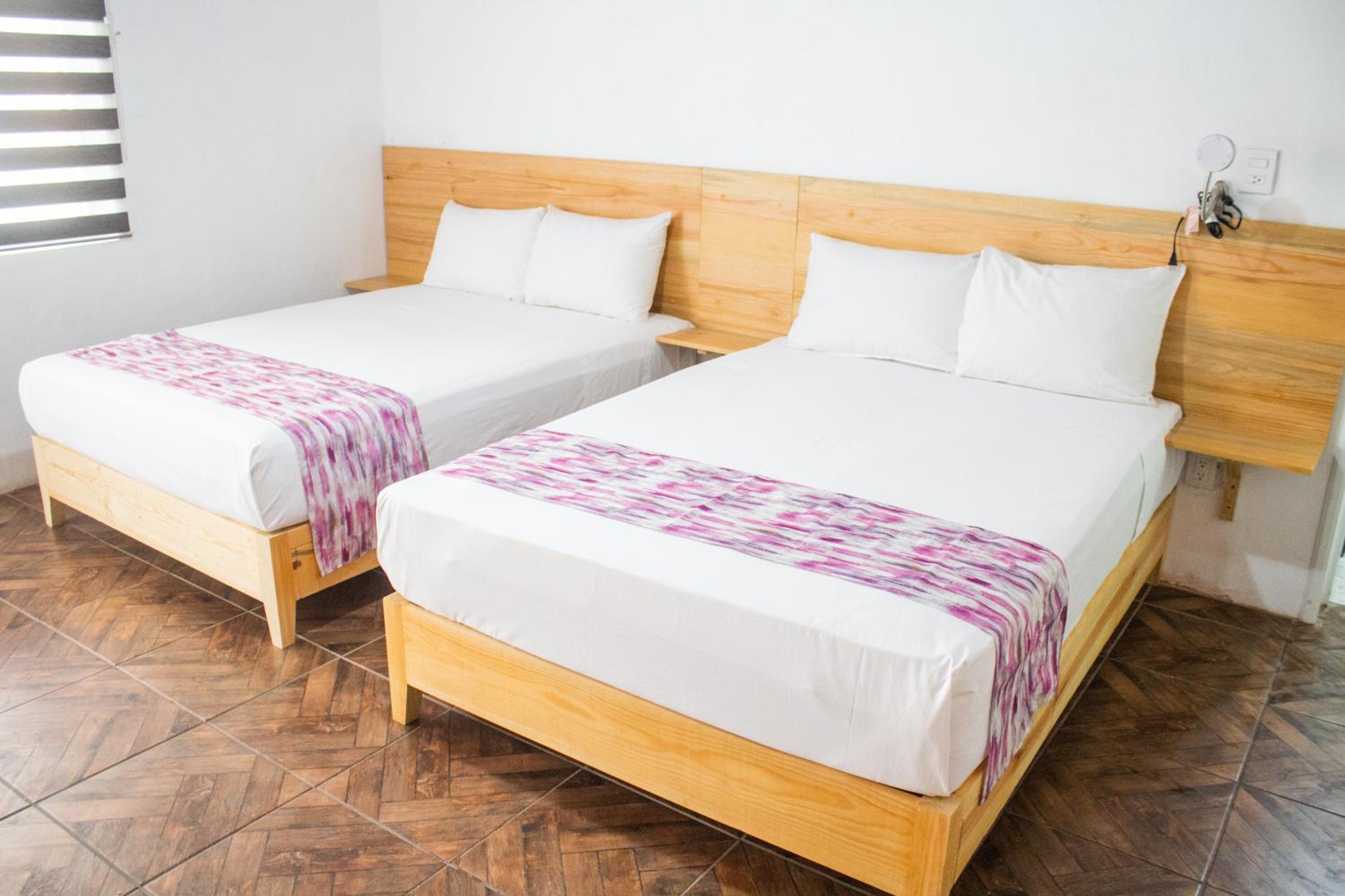 Deluxe Zimmer mit zwei Queen-Betten