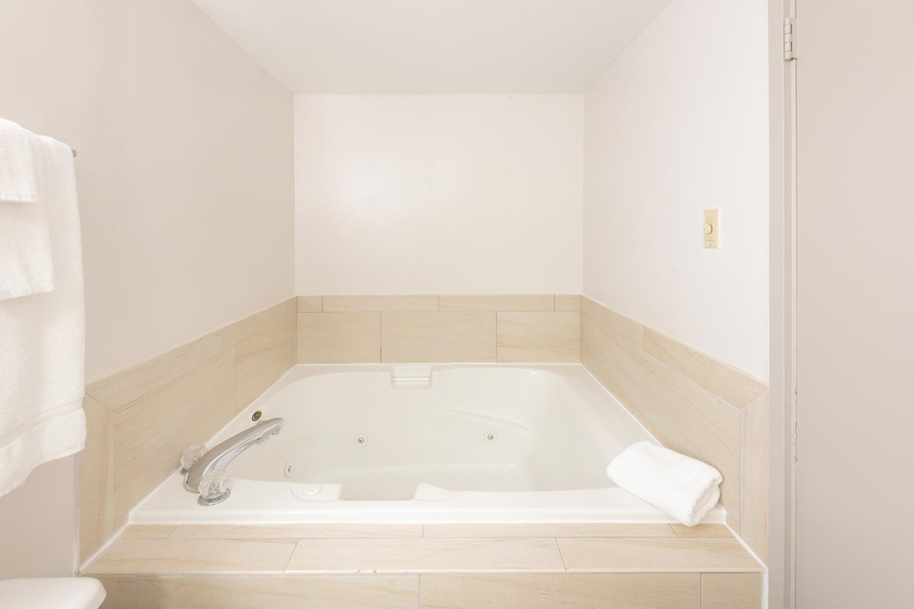 Premium King Room with Jetted Tub - Photo 2