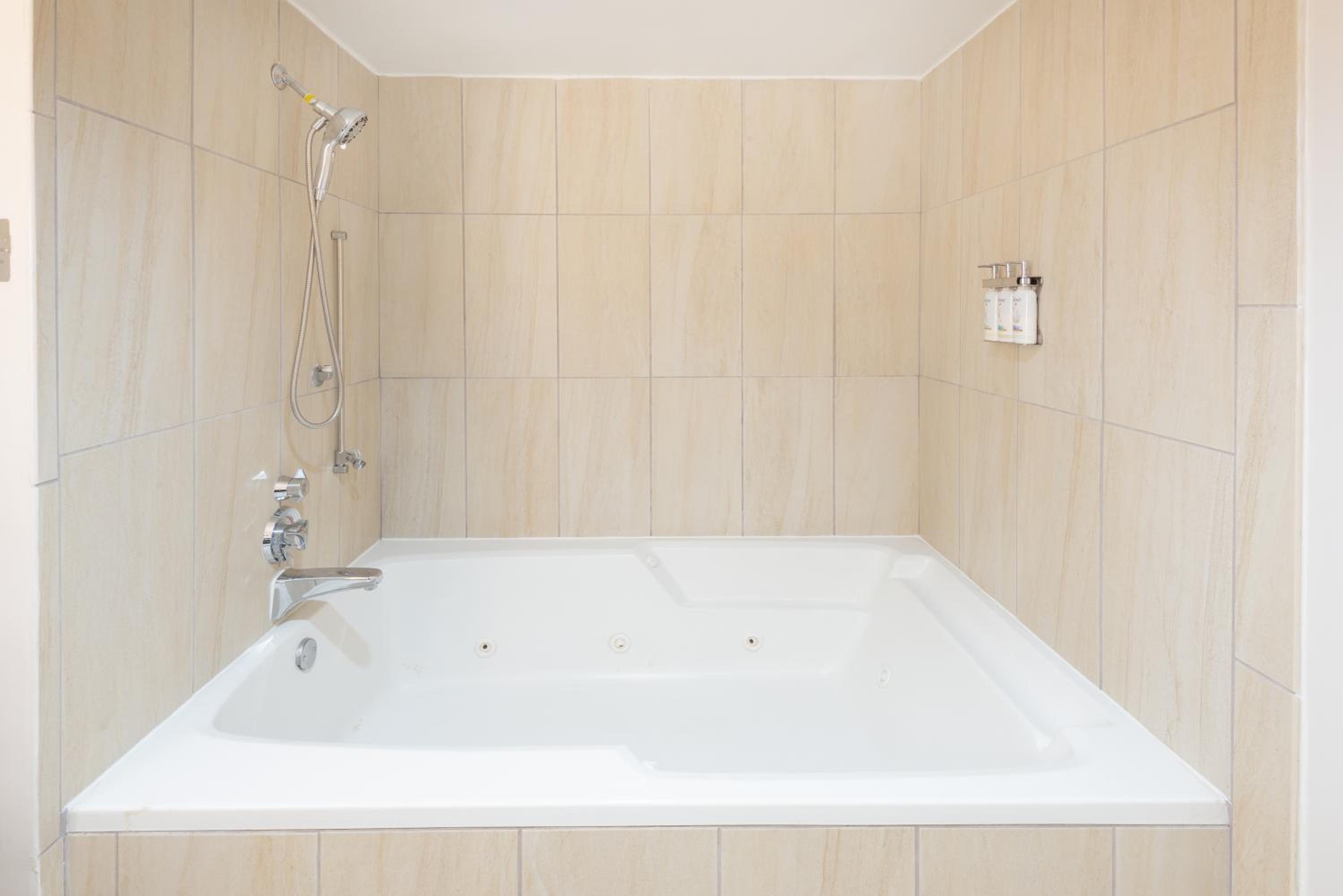 Premium King Room with Jetted Tub - Photo 11