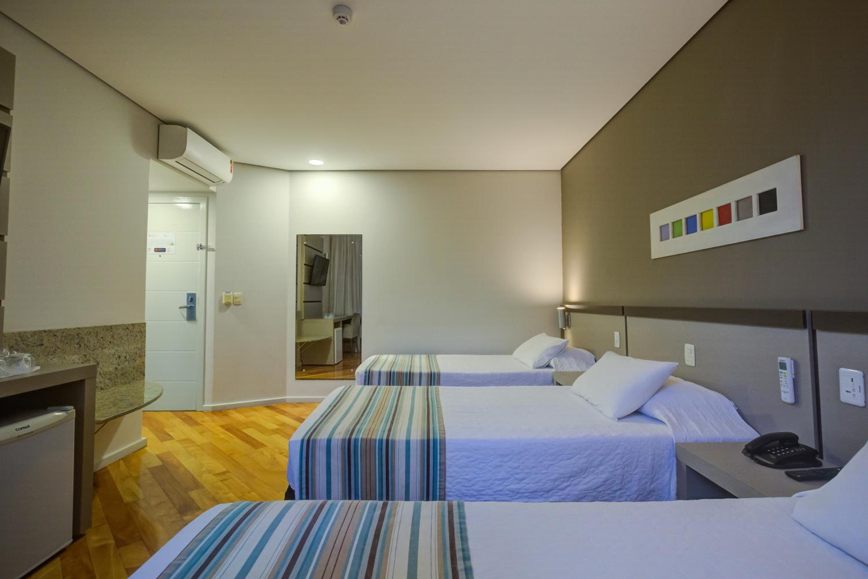 Deluxe Triple Room - Photo 8