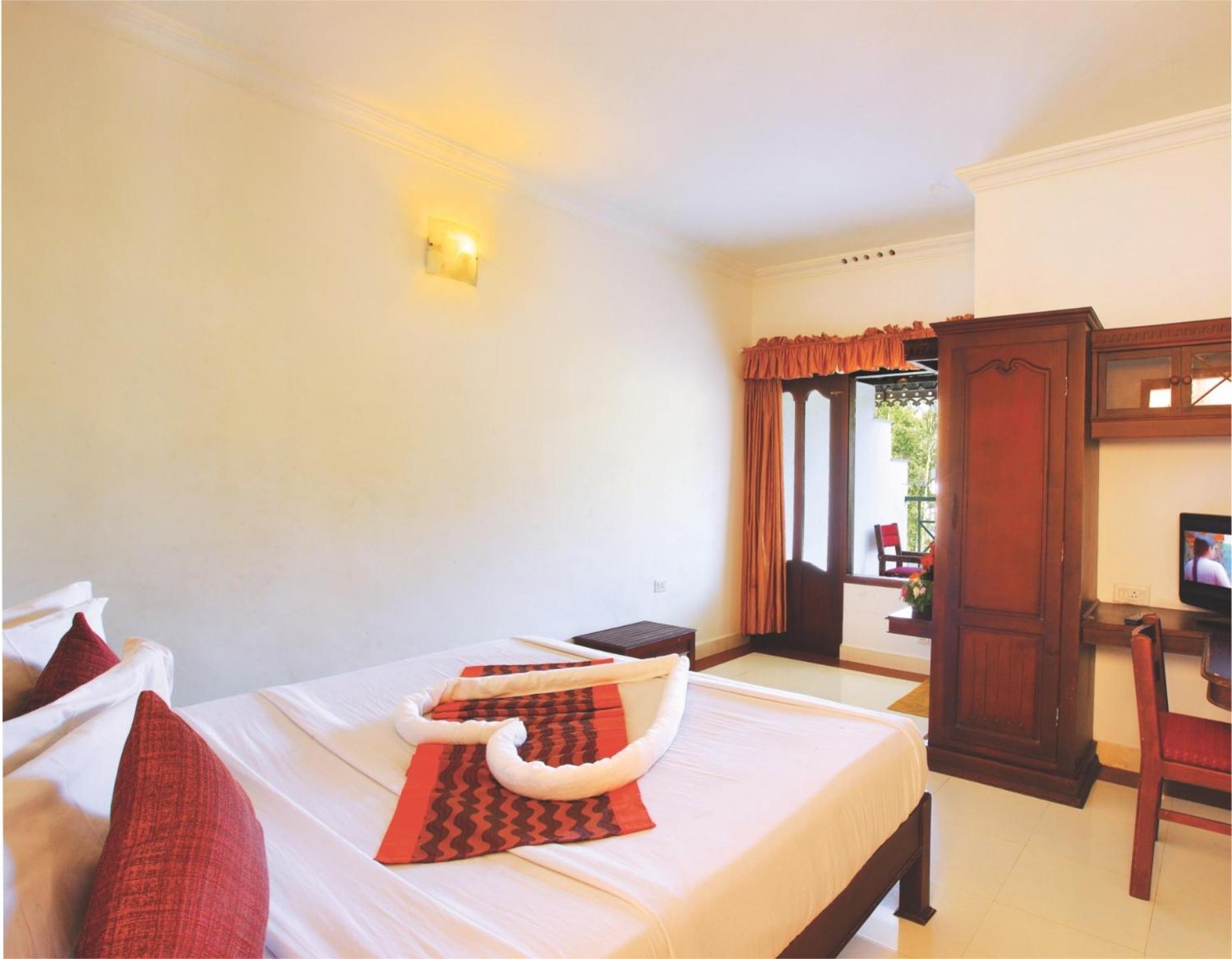 Deluxe Room - Photo 4