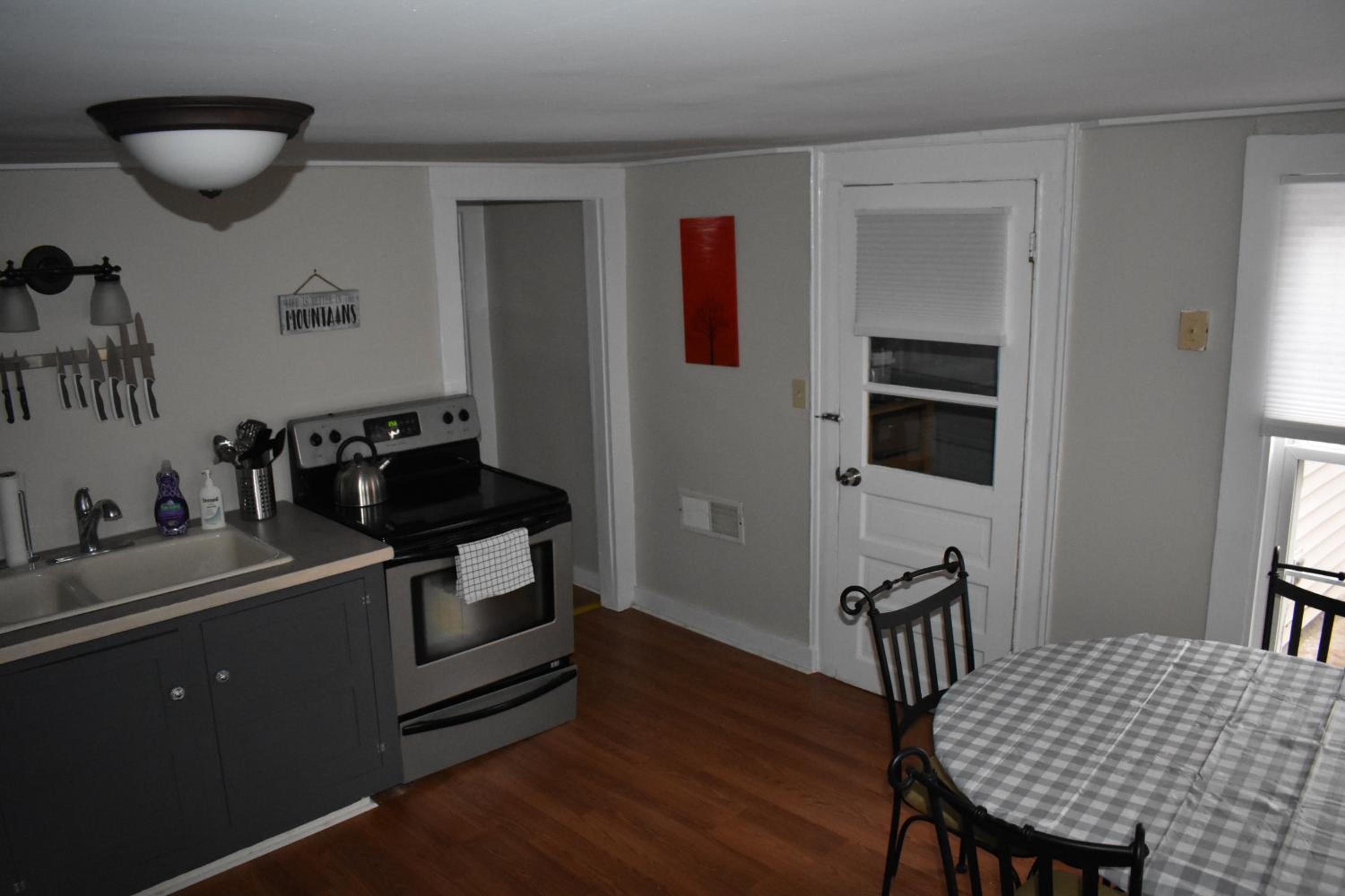 Three-Bedroom House - Photo 26