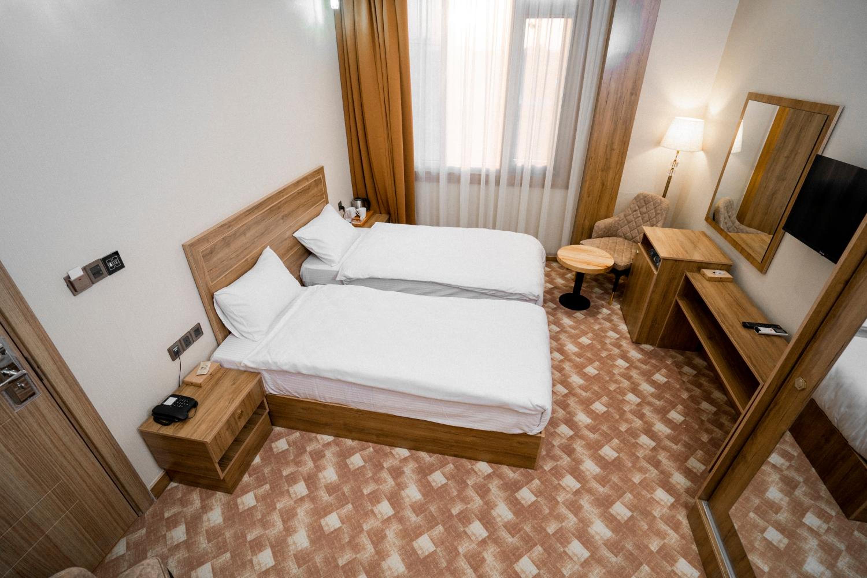 Twin Room - Photo 1