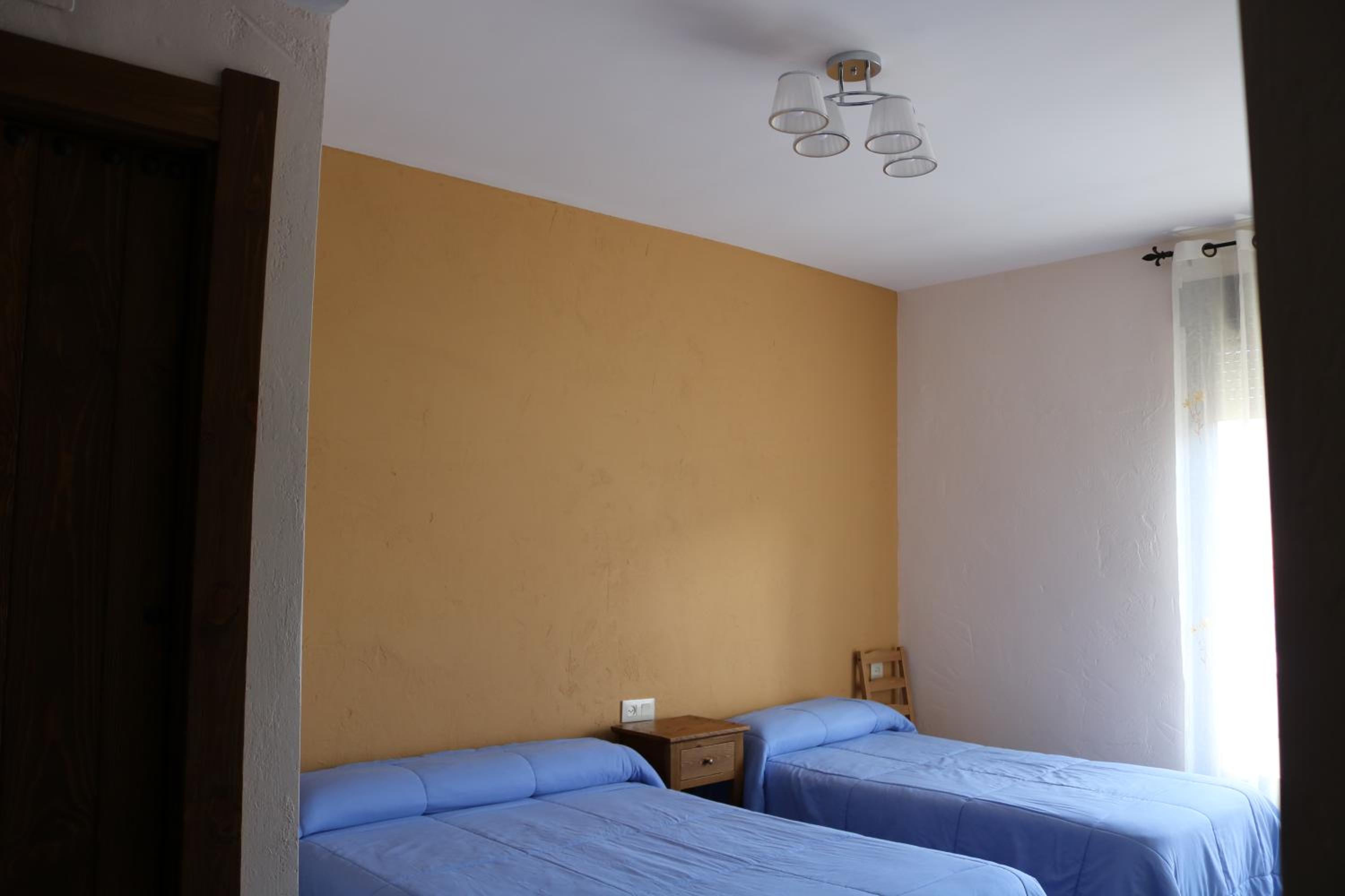 Habitación Triple con Baño Privado