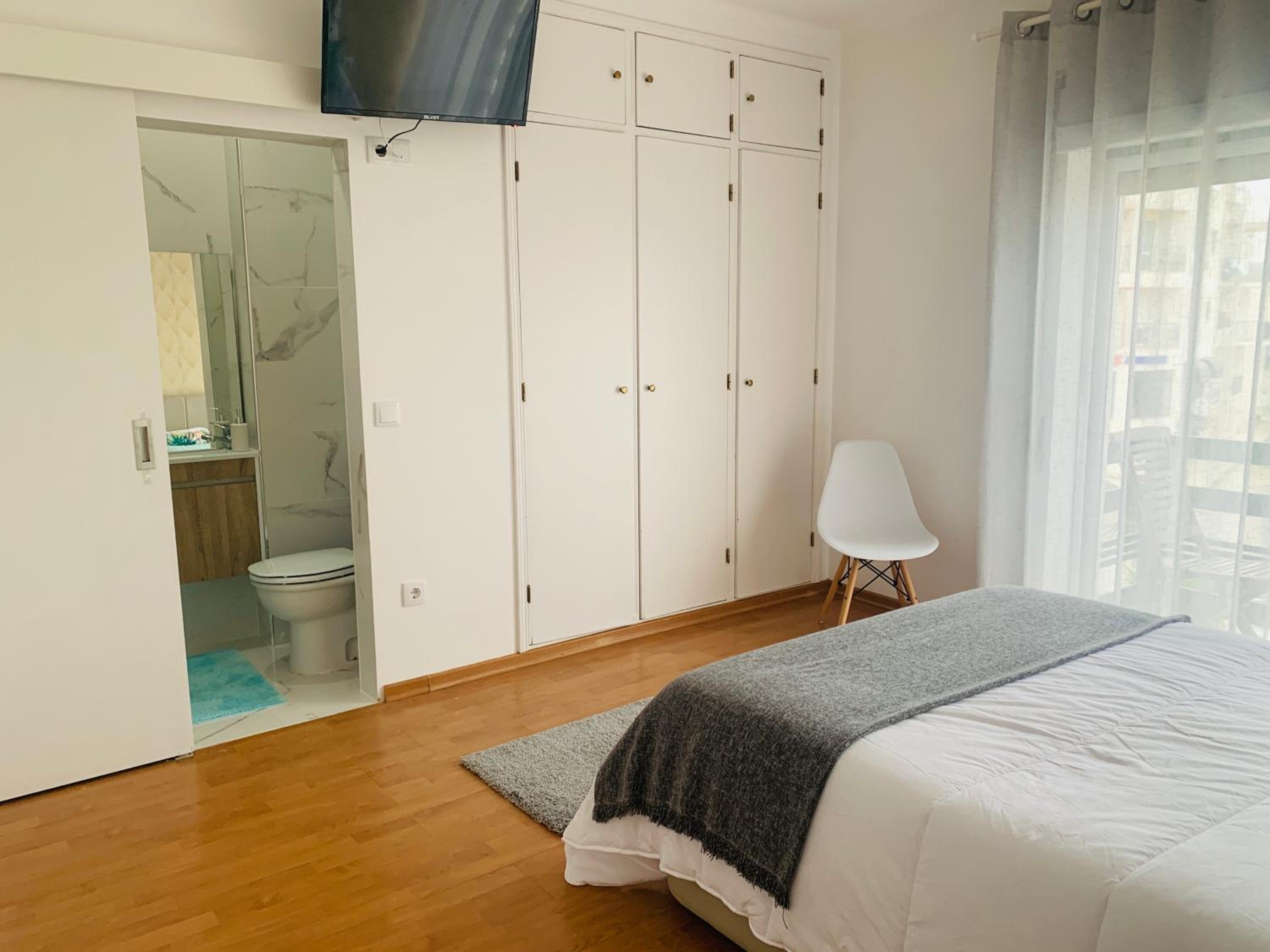 Three-Bedroom Apartment - Photo 10