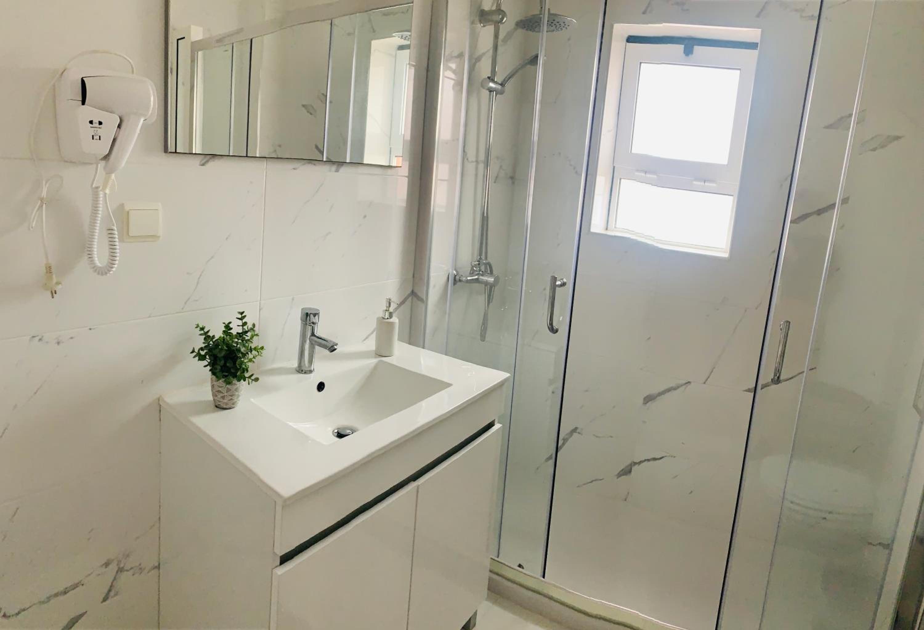Three-Bedroom Apartment - Photo 17