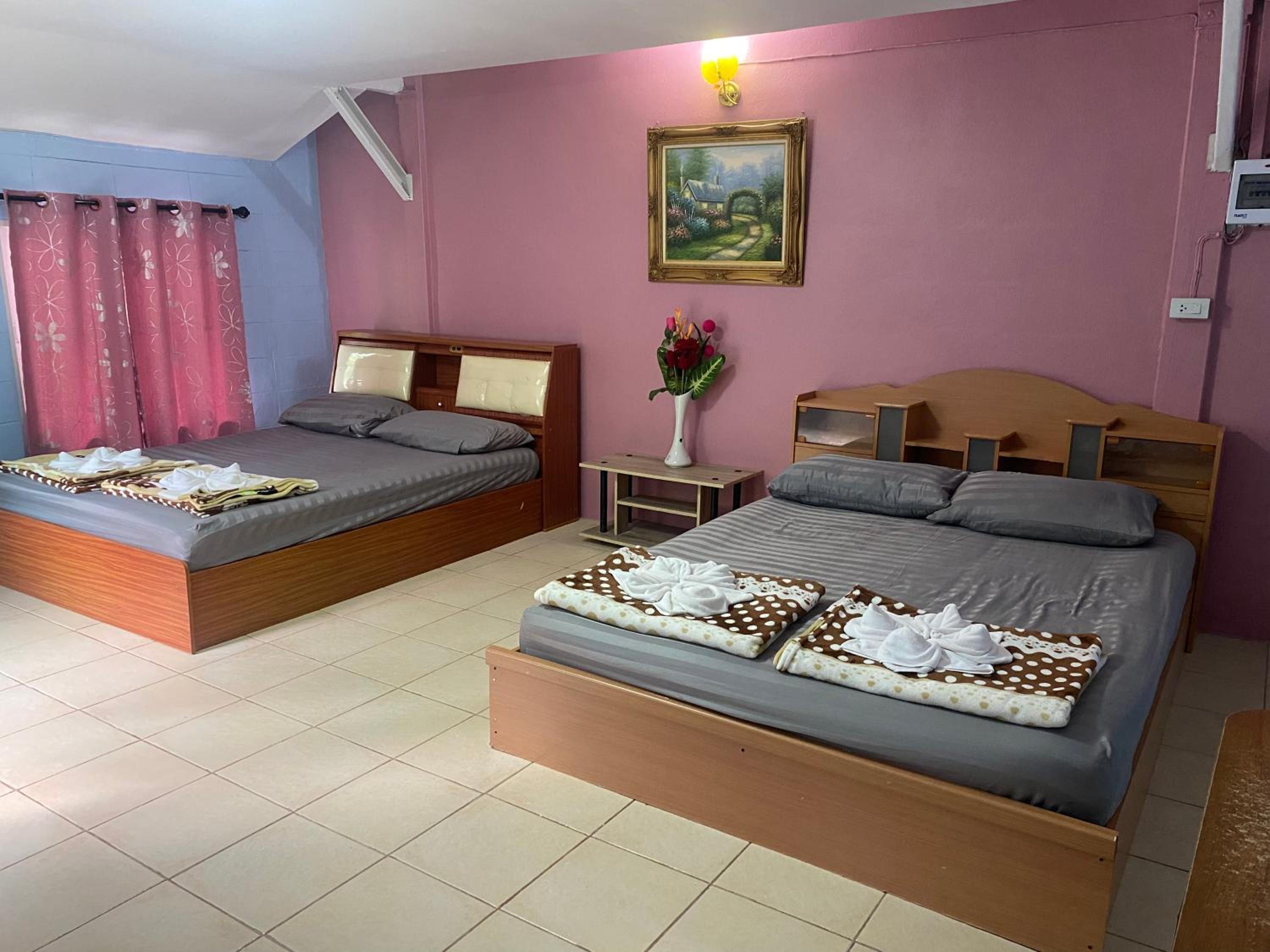 Habitación Deluxe Queen con Dos Camas Queen