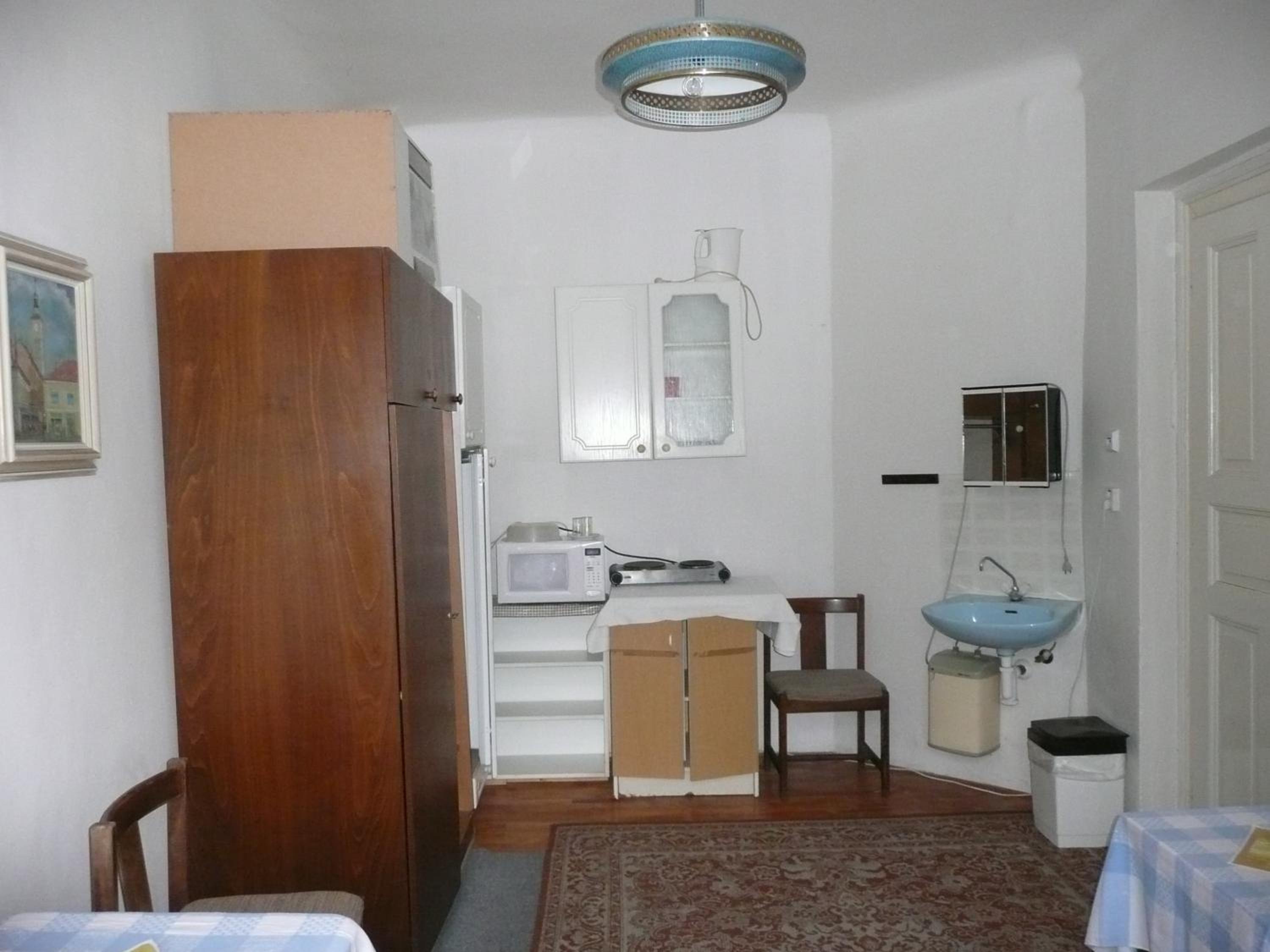 Single Room with Shared Shower and Toilet