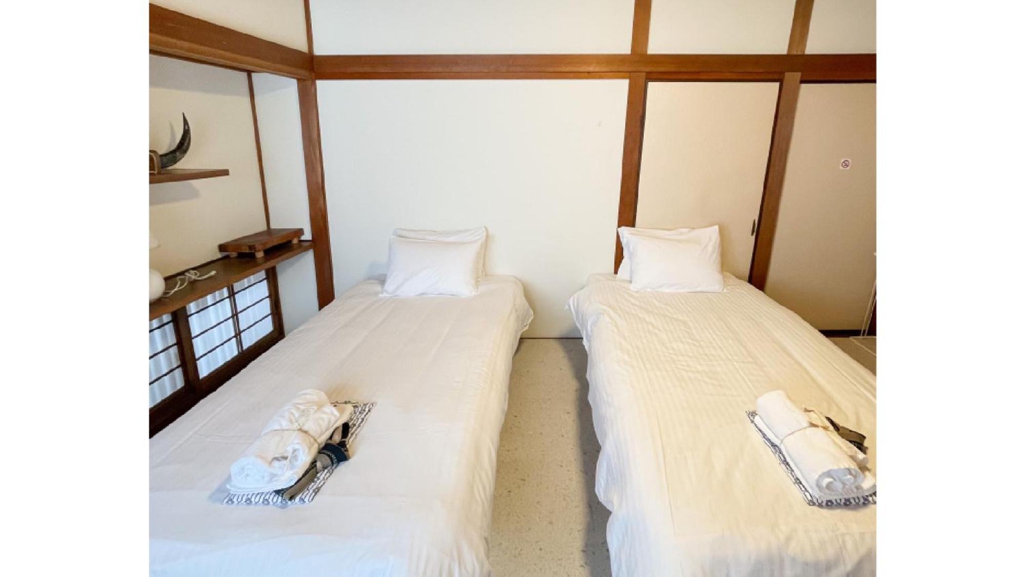 Economy Twin Room with Shared Shower room and Toilet - Non-Smoking photo 1