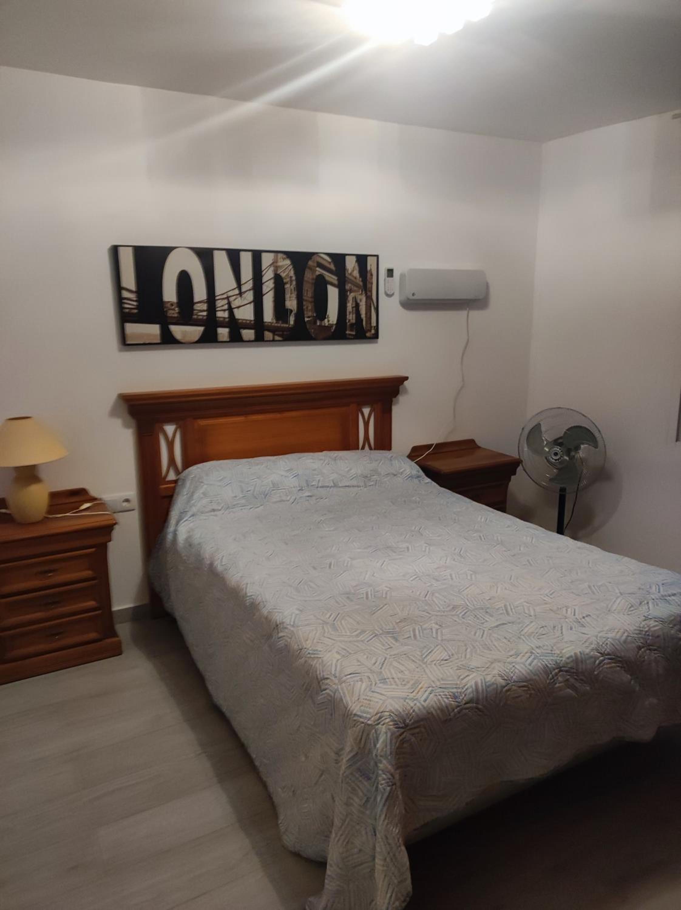 Three-Bedroom Apartment - Photo 19