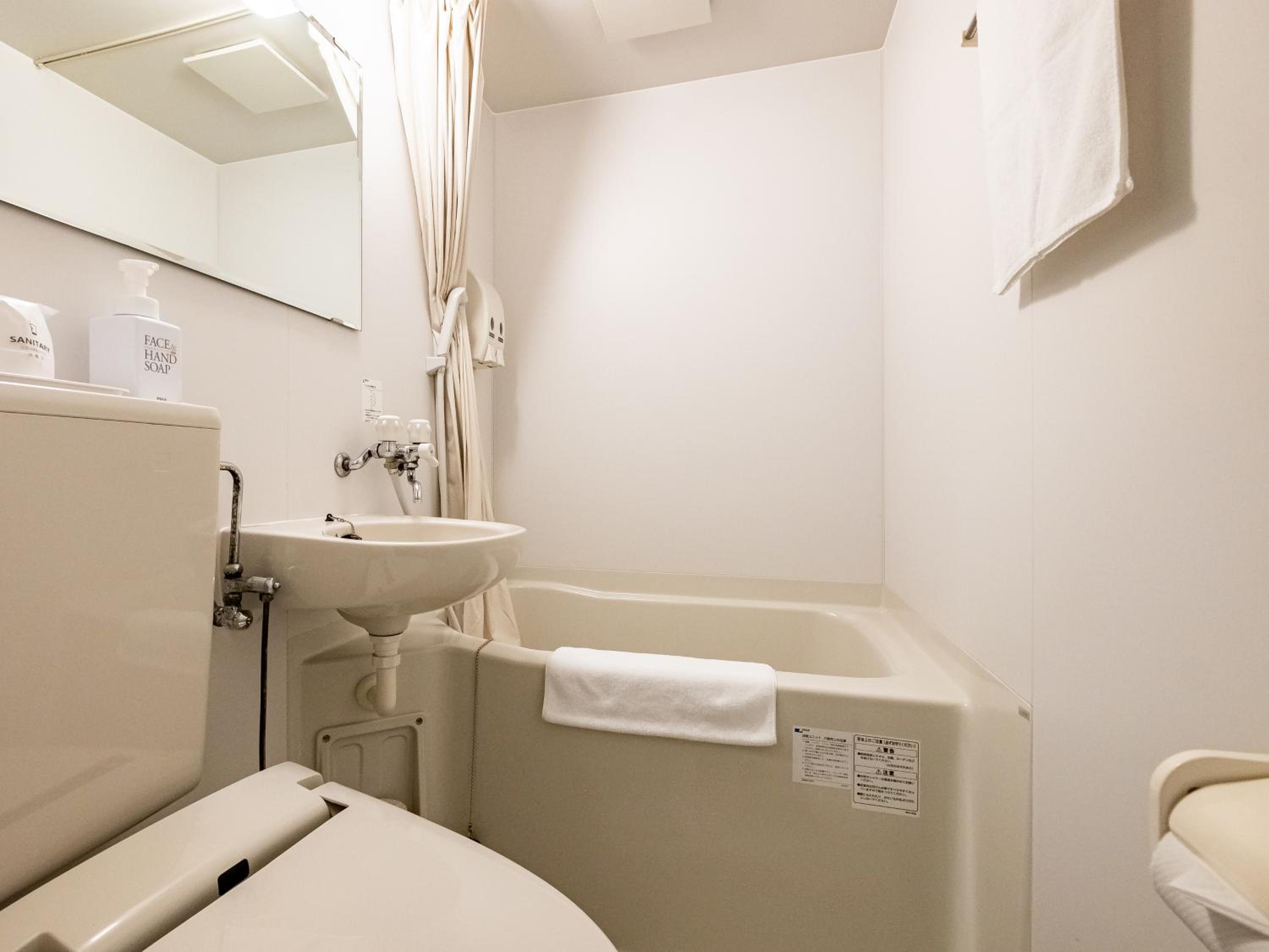 Twin Room - Photo 9