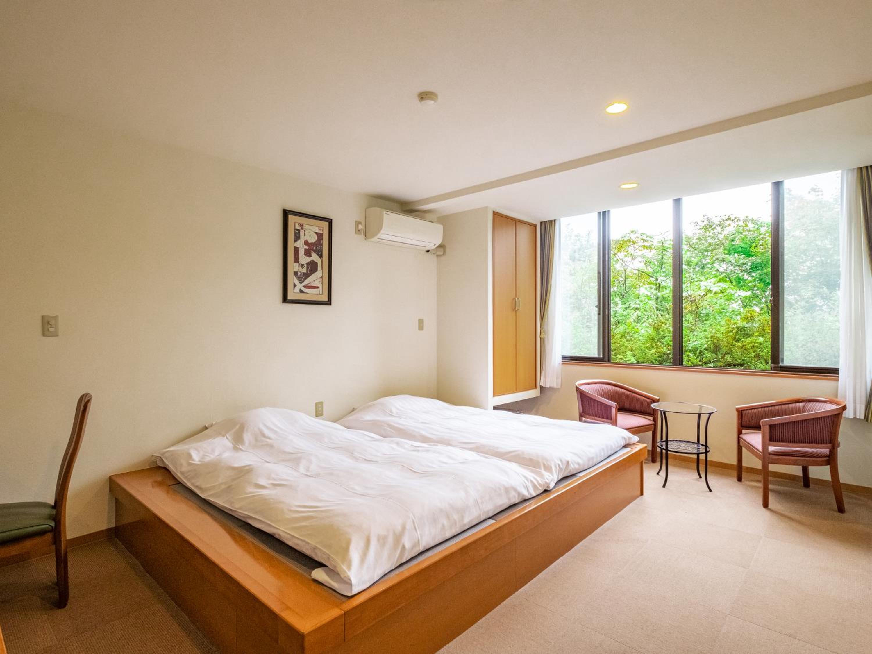 Twin Room - Photo 1