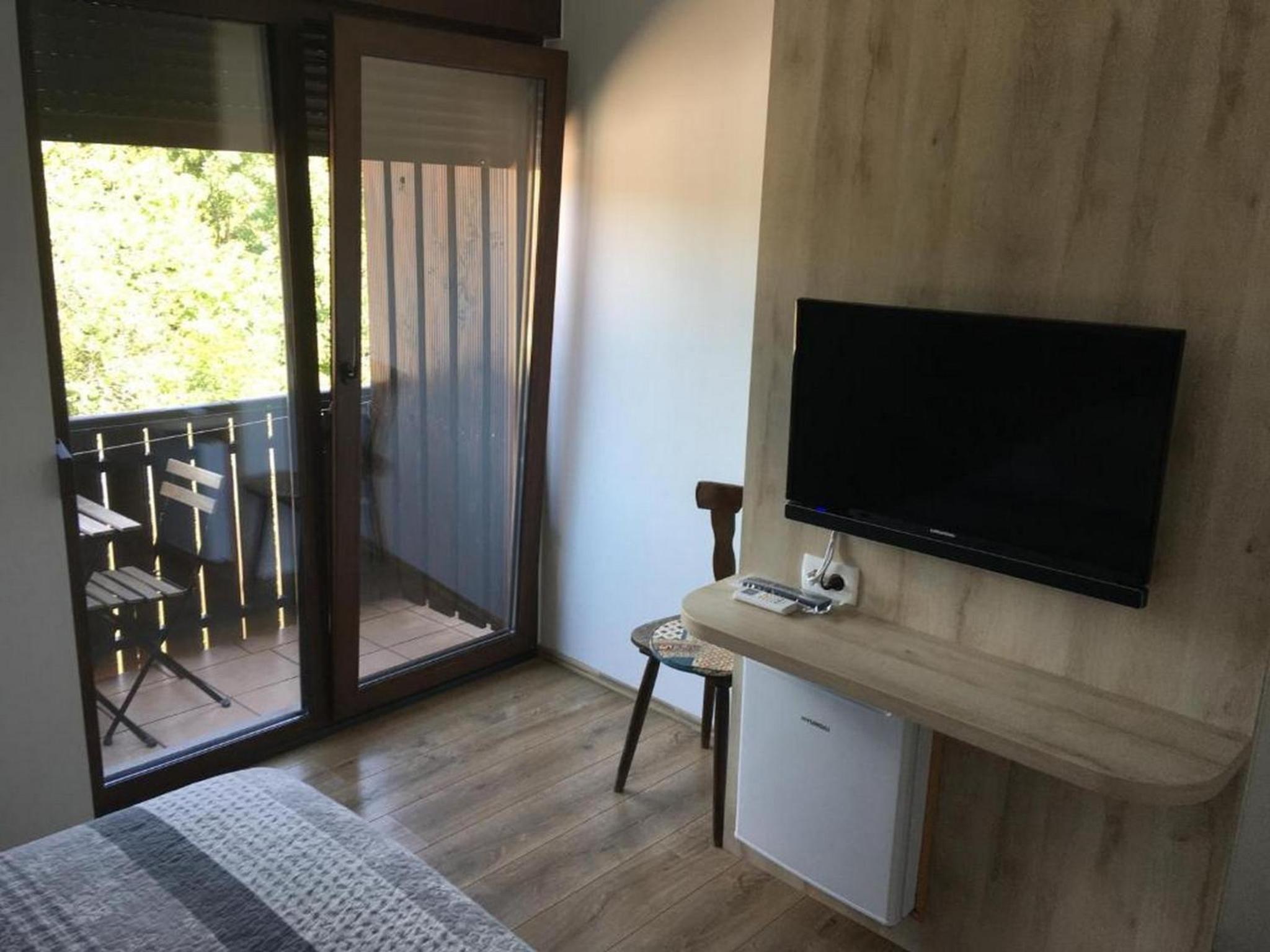 Duplex Family Room with Balcony - Photo 7