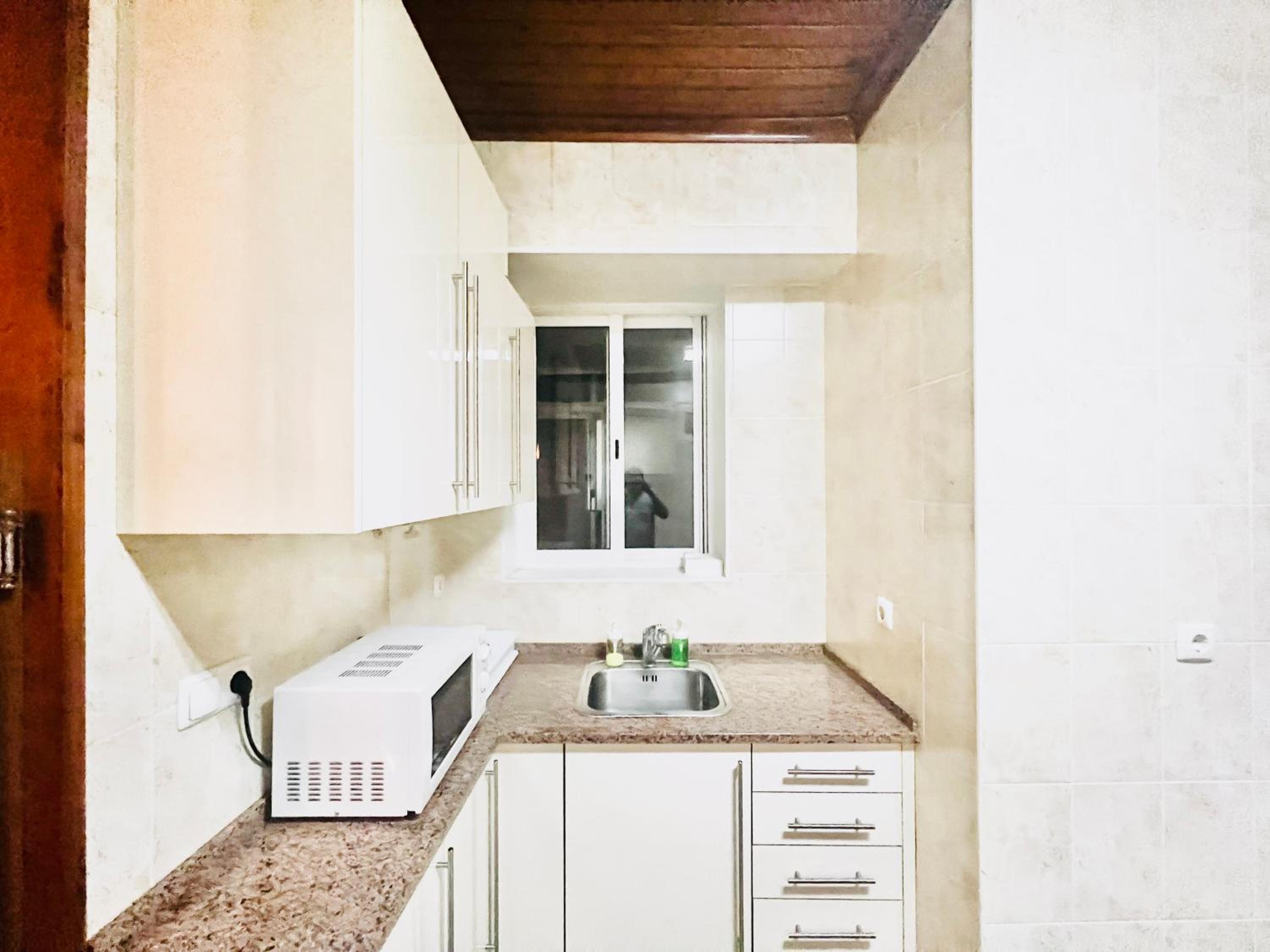 Three-Bedroom Apartment - Photo 17