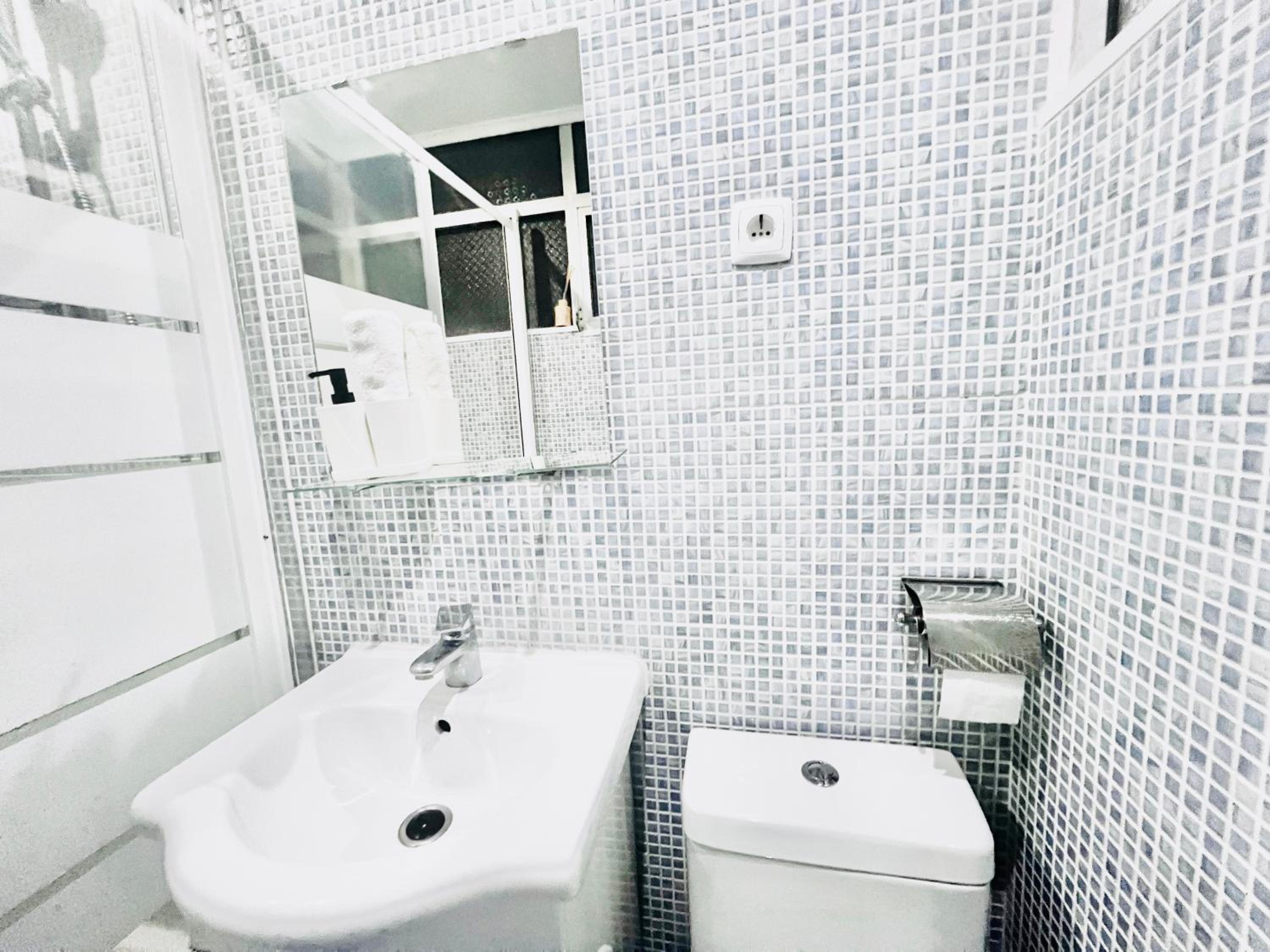 Three-Bedroom Apartment - Photo 19