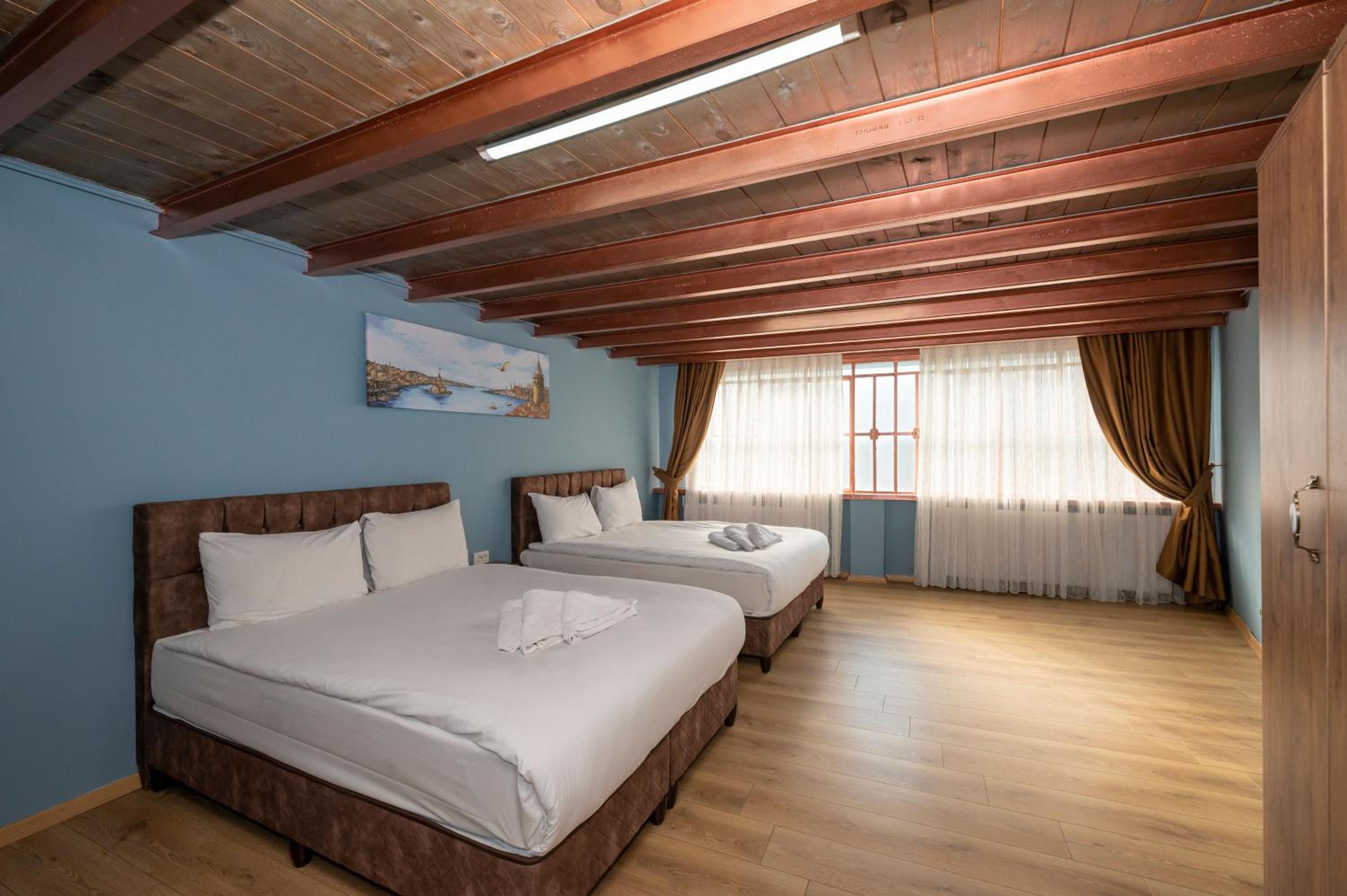 Quadruple Room with Balcony