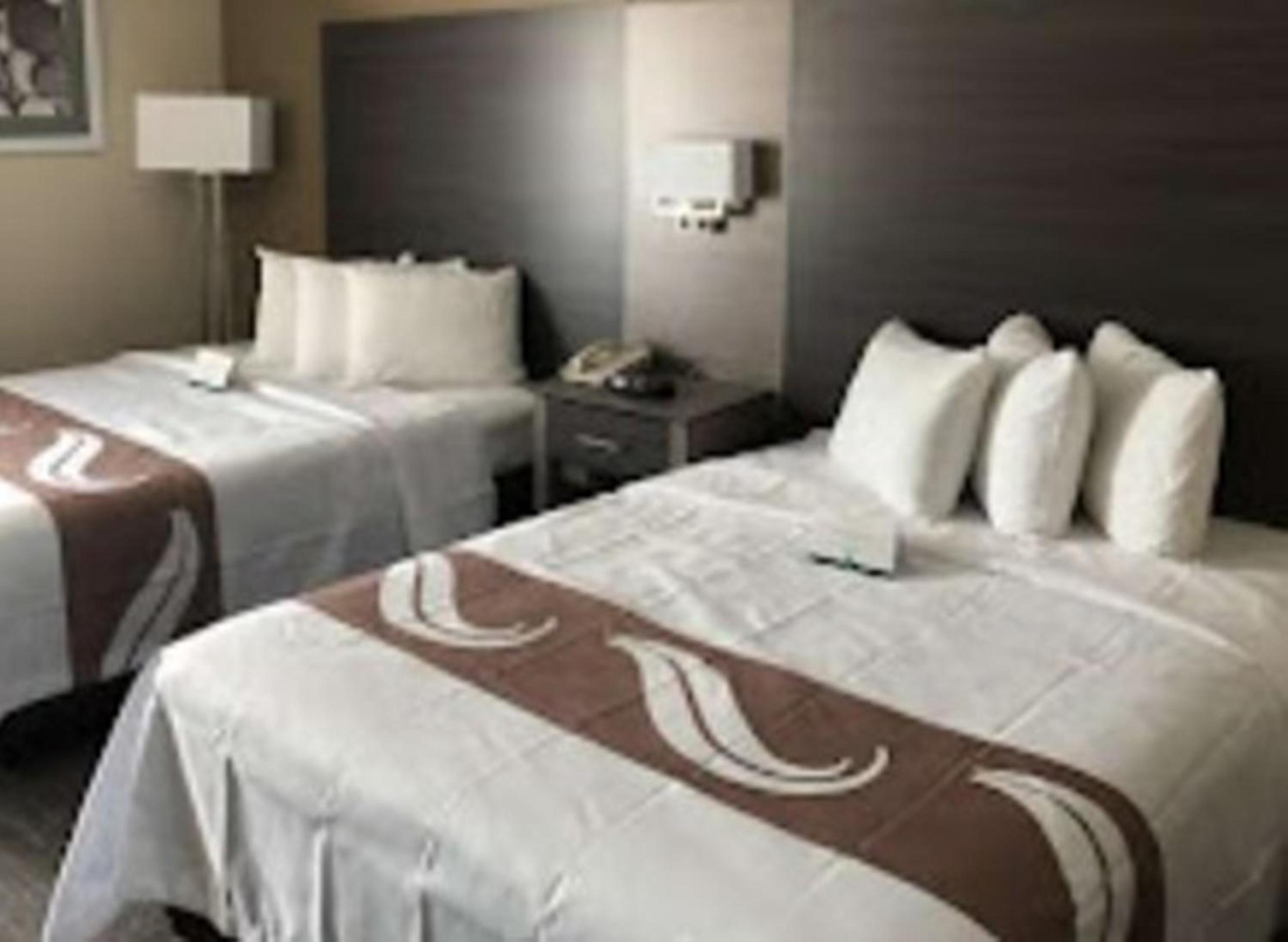 Queen Room with Two Queen Beds - Non-Smoking - Photo 1