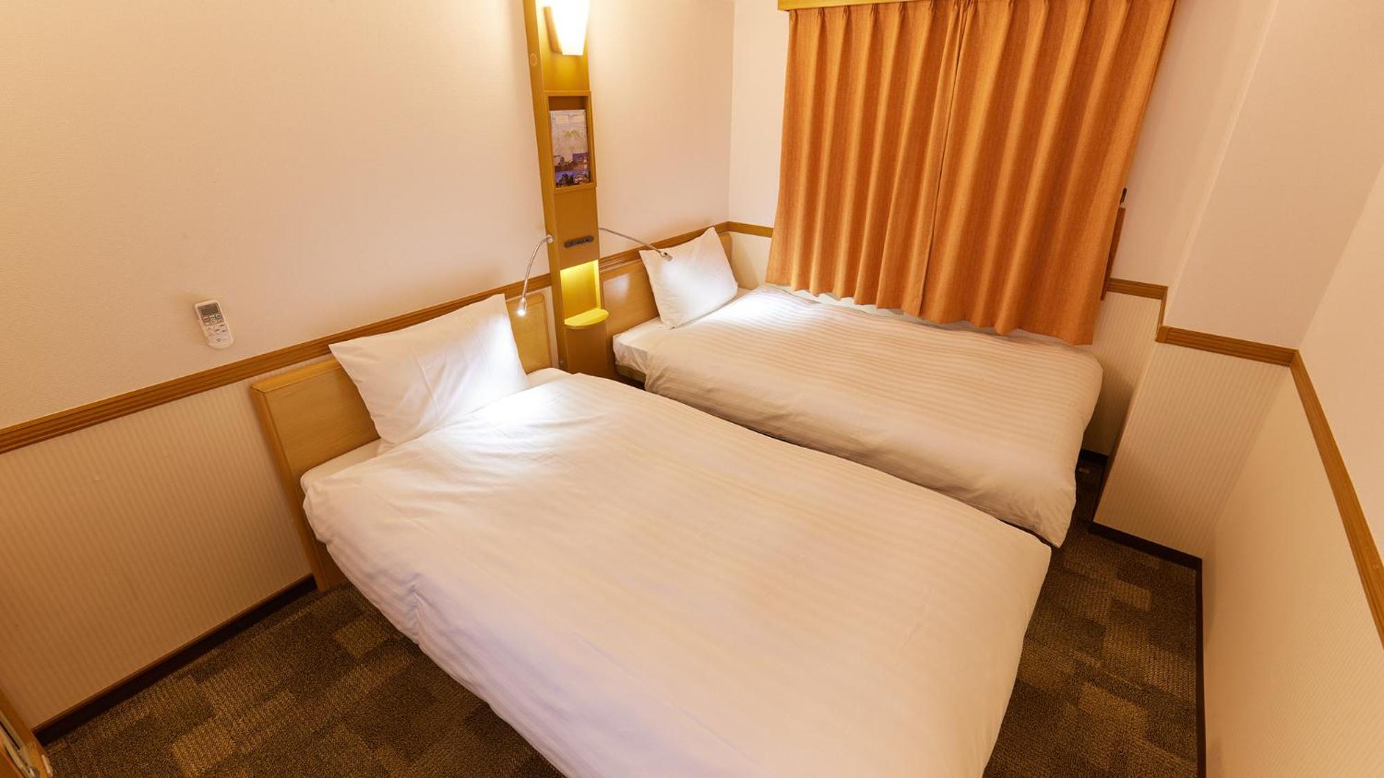 Twin Room - Non-Smoking photo 2