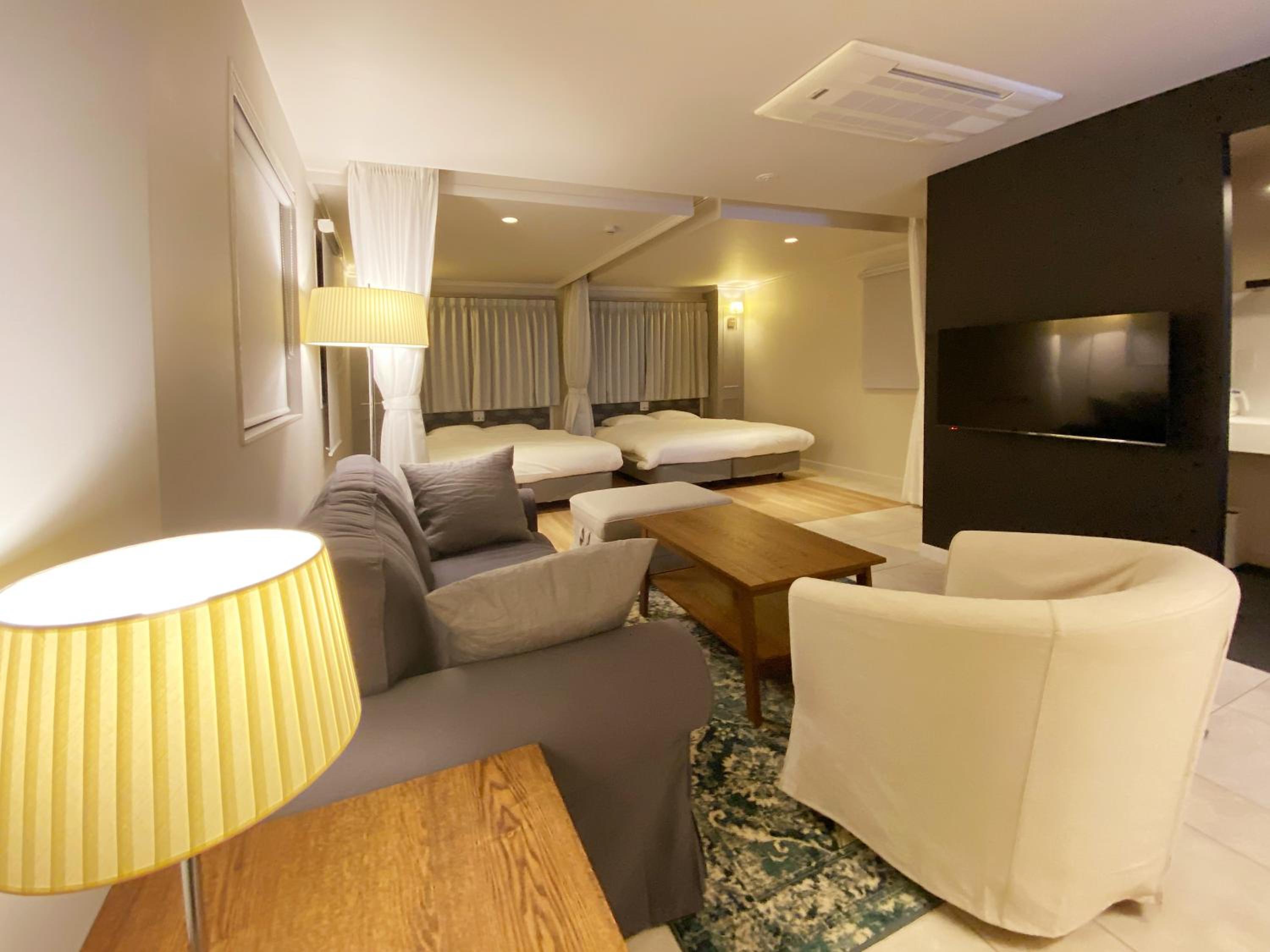 Standard Queen Room with Two Queen Beds - Photo 1
