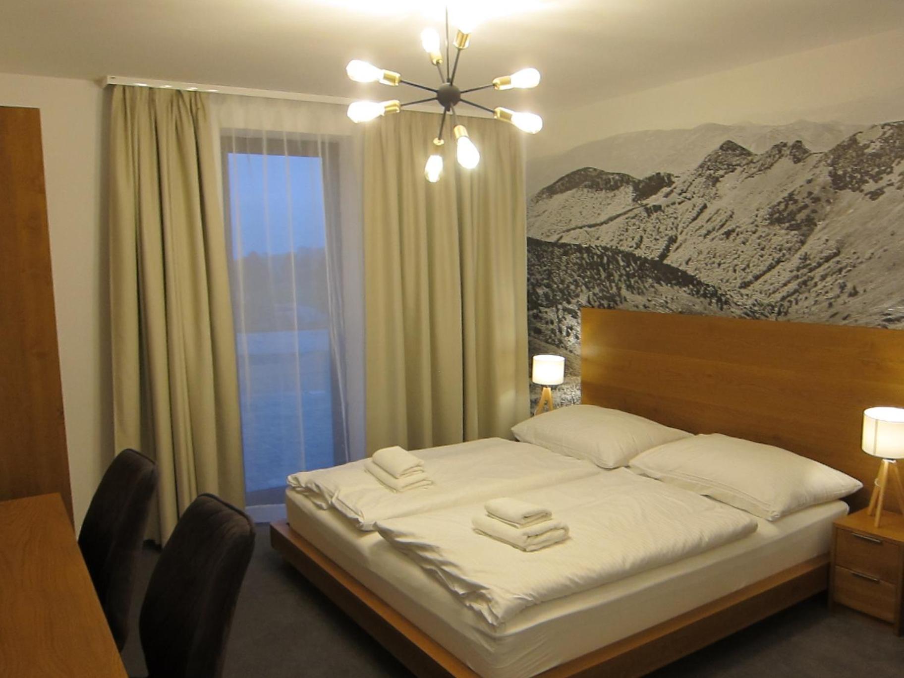 Deluxe Double Room (2 Adults + 1 Child) - Photo 1