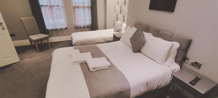 Deluxe Triple Room - Photo 4