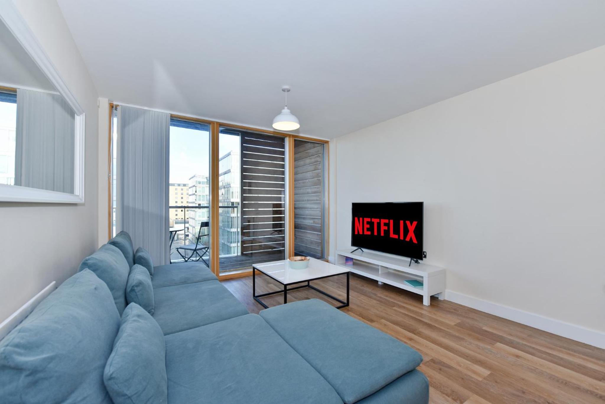 One-Bedroom Apartment with Balcony and City View