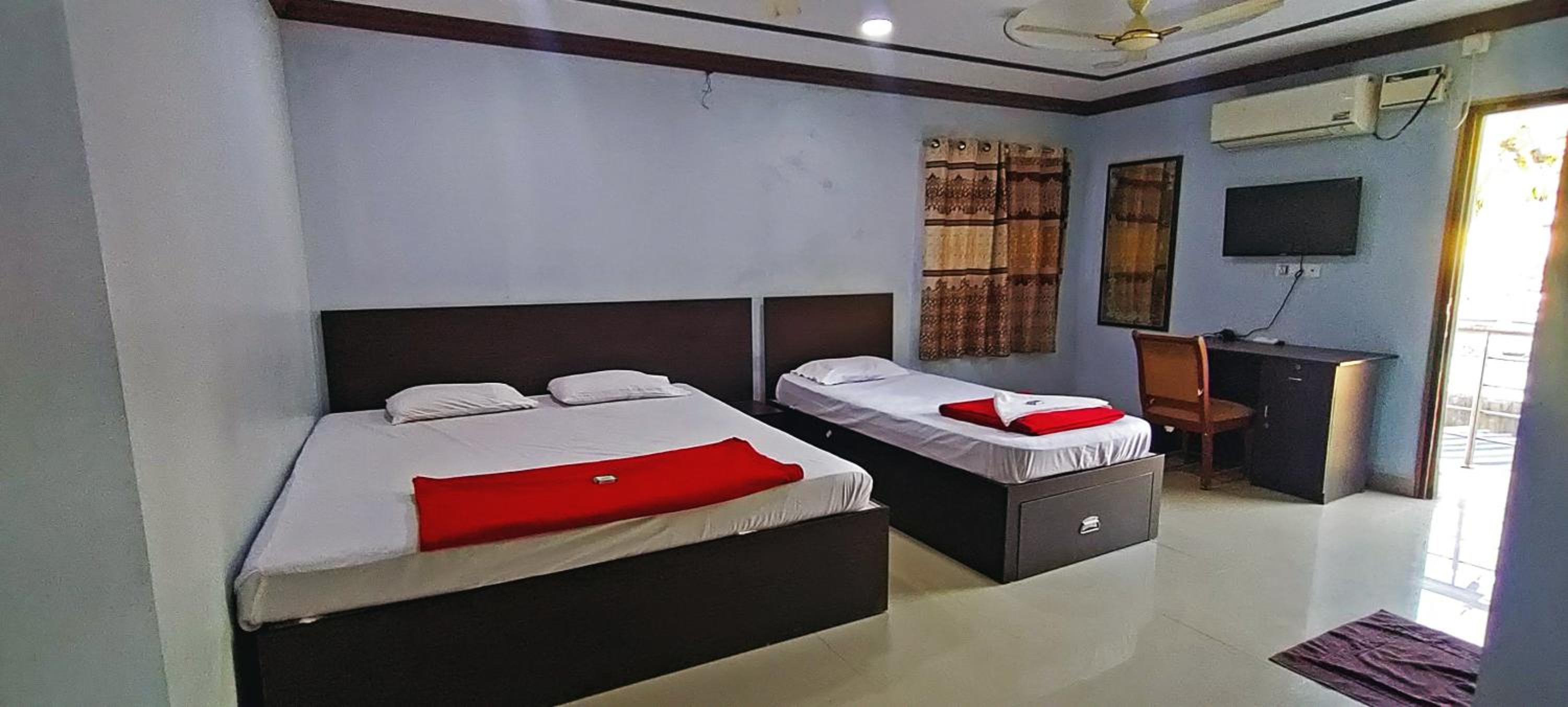 Deluxe Triple Room - Photo 1