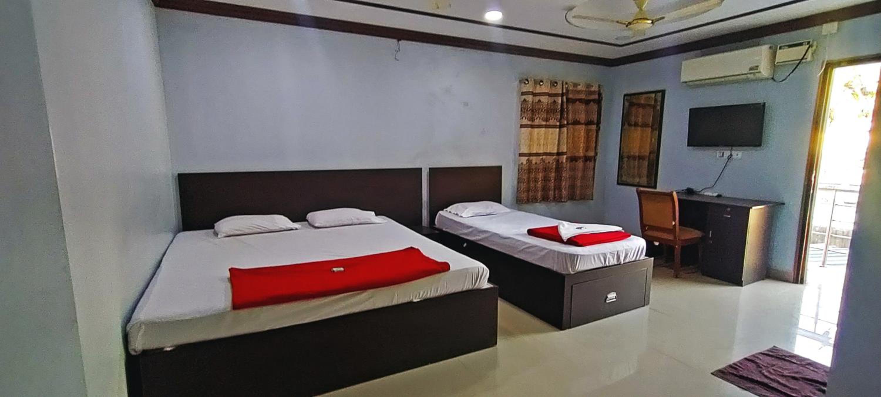 Deluxe Triple Room - Photo 23