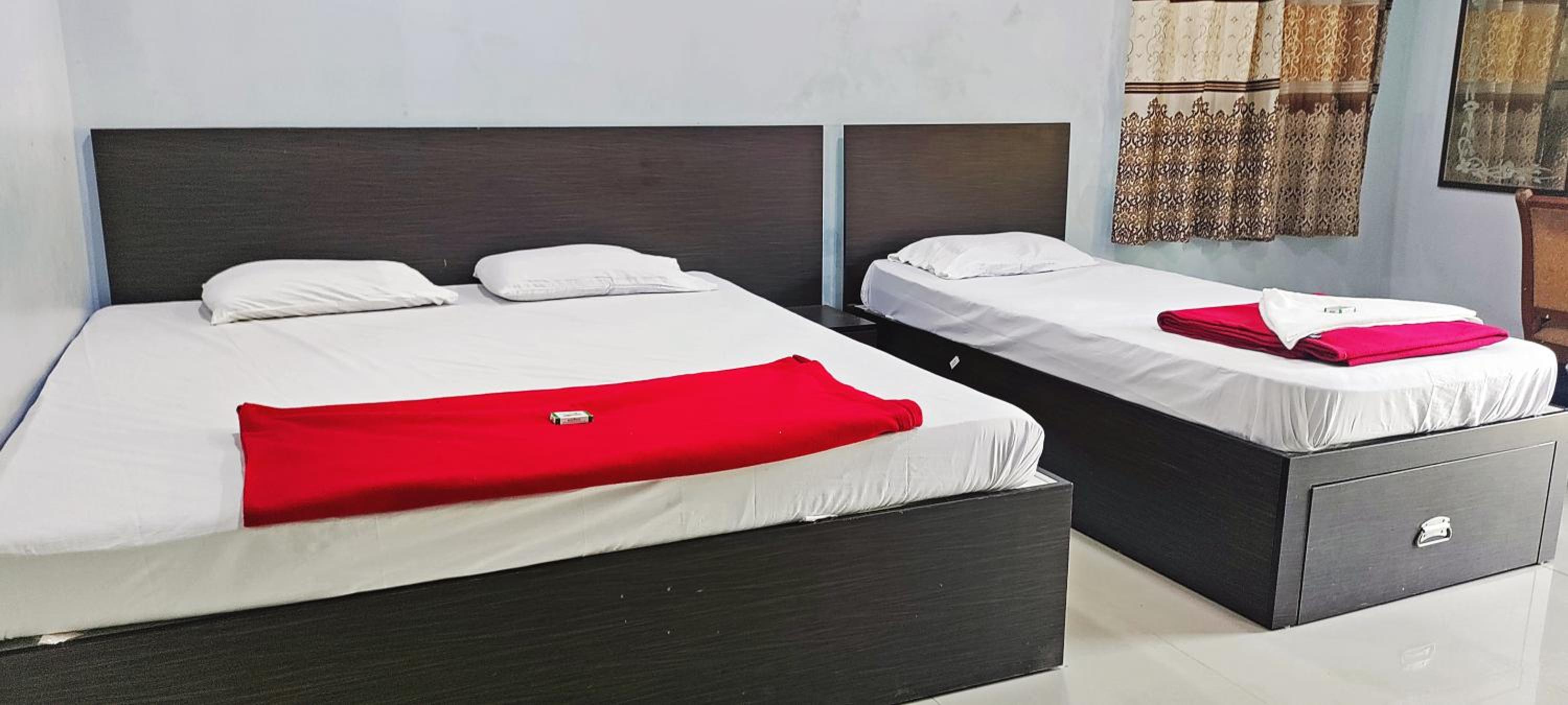 Deluxe Triple Room - Photo 19