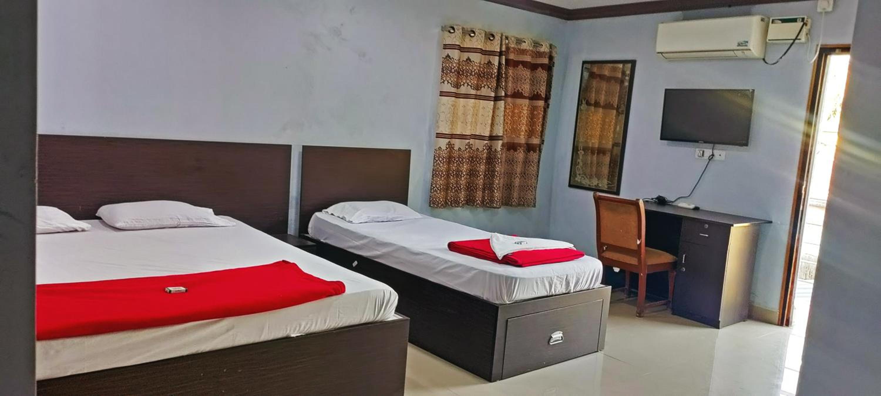 Deluxe Triple Room - Photo 22