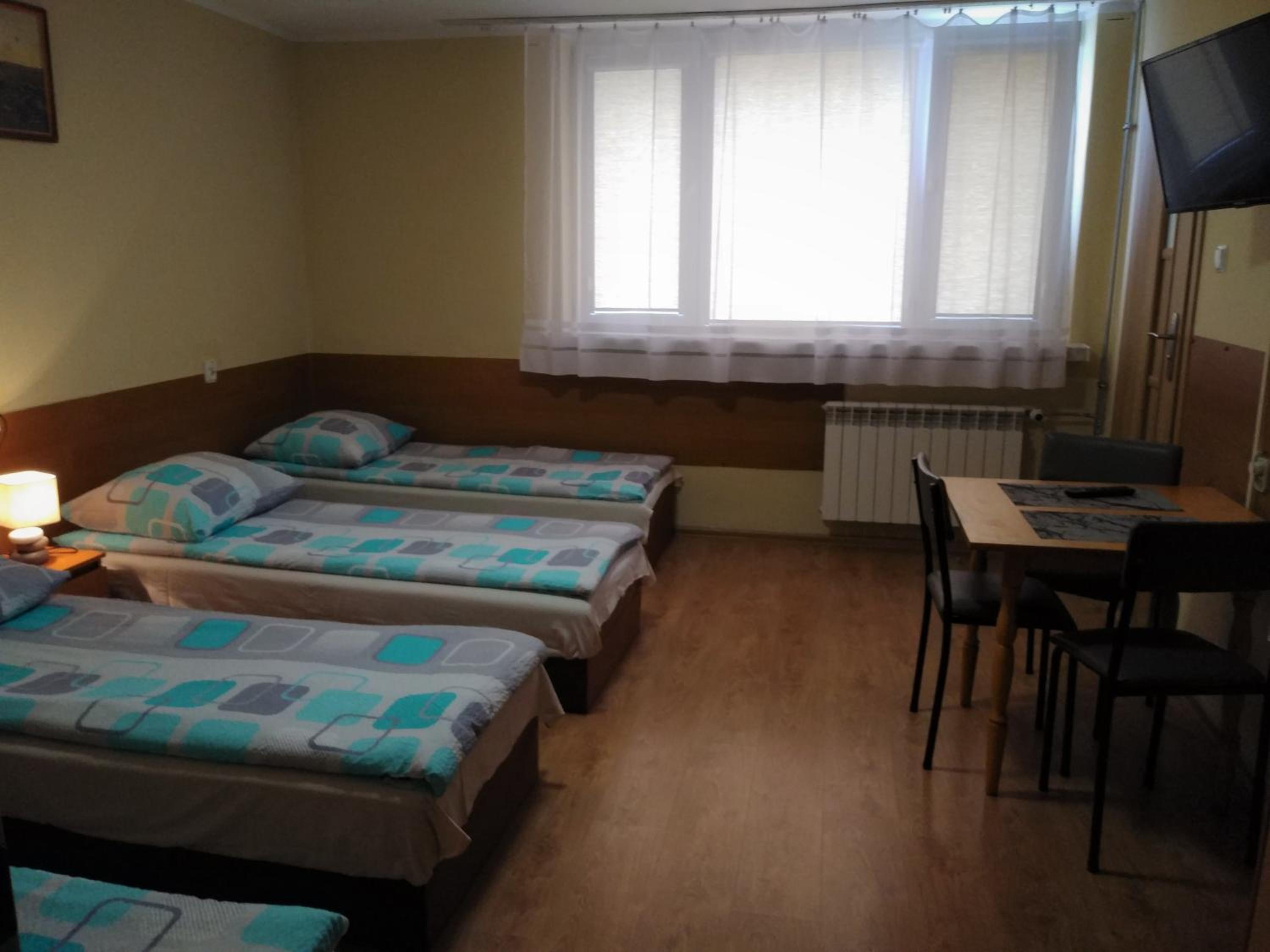 Quadruple Room with Private Bathroom photo 1