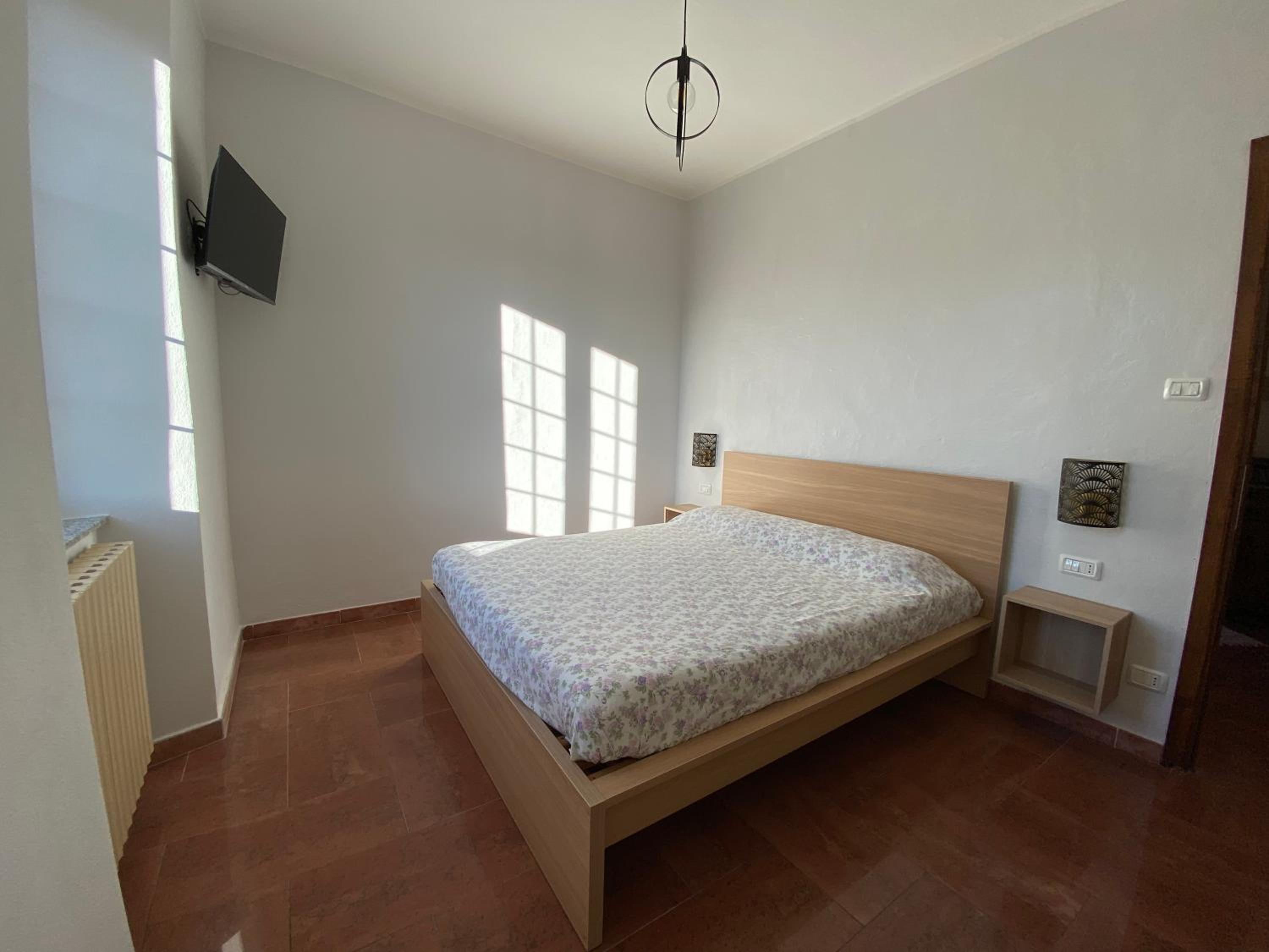 Three-Bedroom House - Photo 23